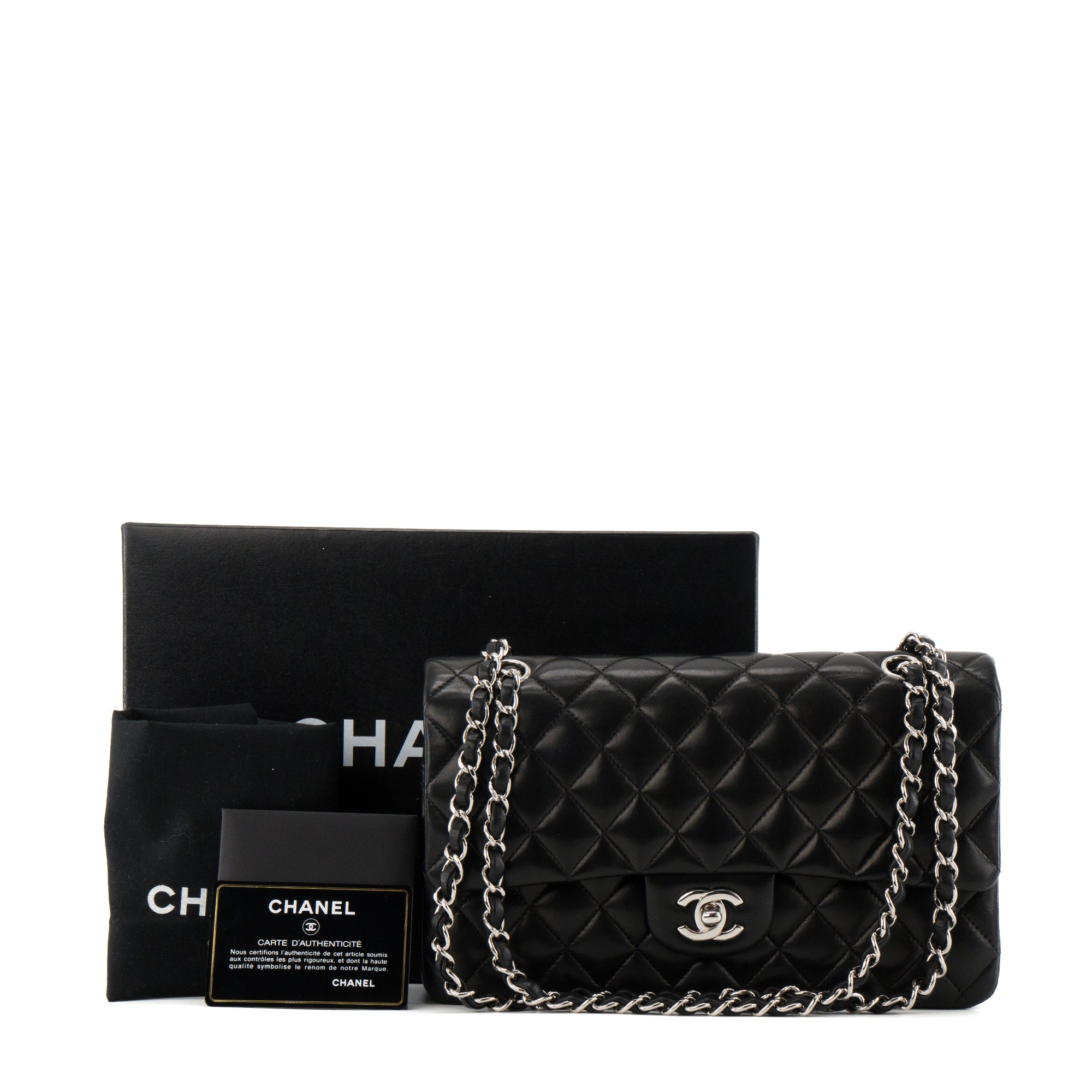 CHANEL - Sac à main Classique/Timeless Chanel 11.12 Chanel en cuir lisse noir