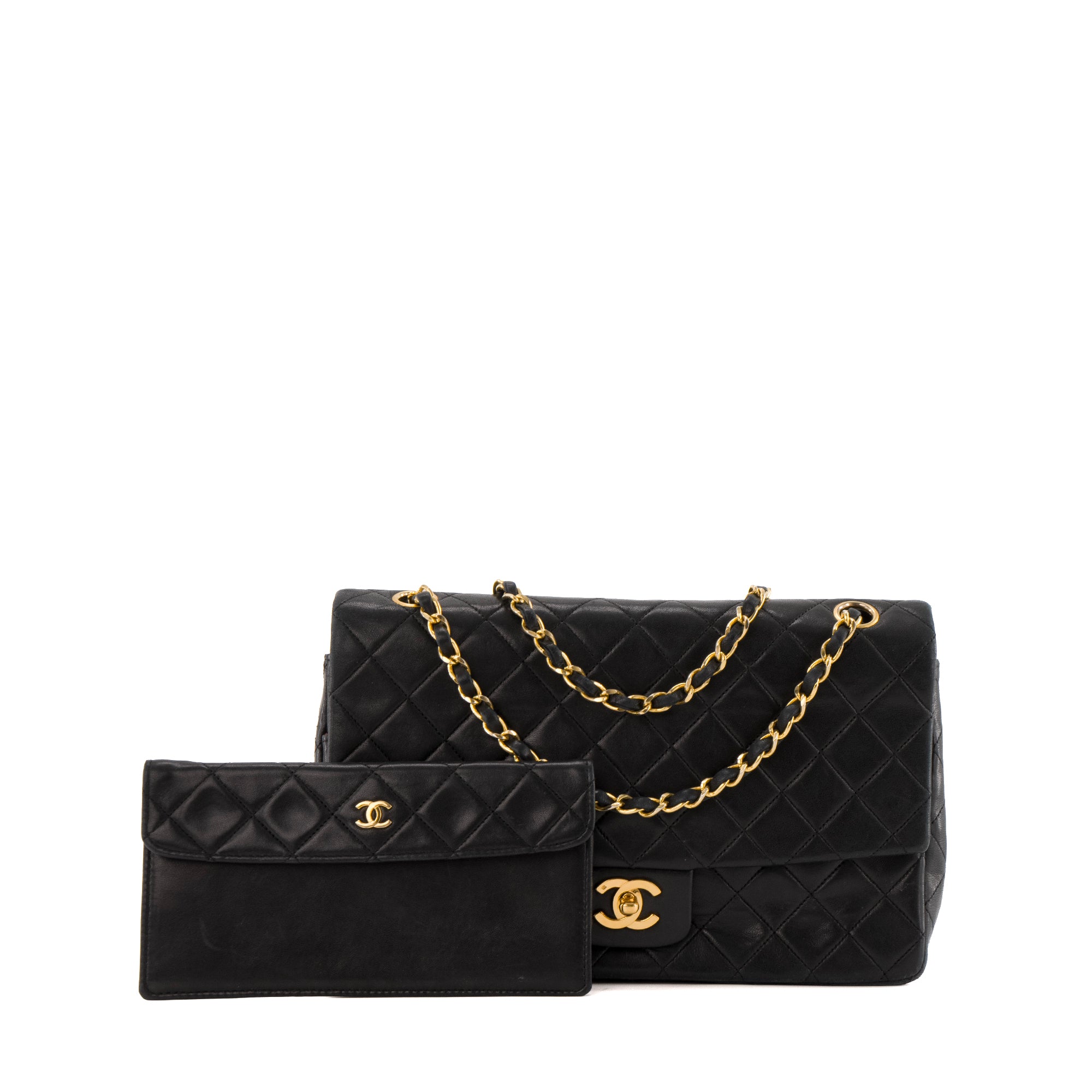 CHANEL - Sac à main Classique/Timeless Chanel en cuir noir avec pochette vintage