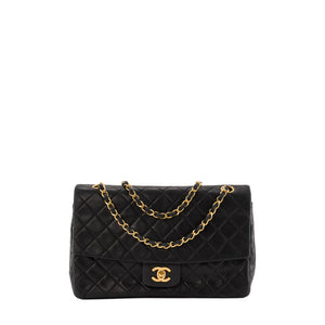CHANEL - Sac à main Classique/Timeless Chanel en cuir noir avec pochette vintage