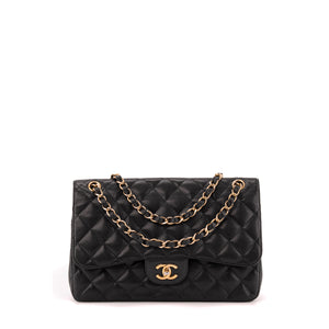 CHANEL - Sac à bandoulière Classique/Timeless Jumbo Chanel en cuir caviar noir
