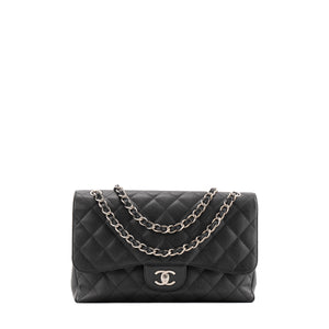 CHANEL - Sac à bandoulière Classique/Timeless Jumbo Chanel en cuir caviar noir