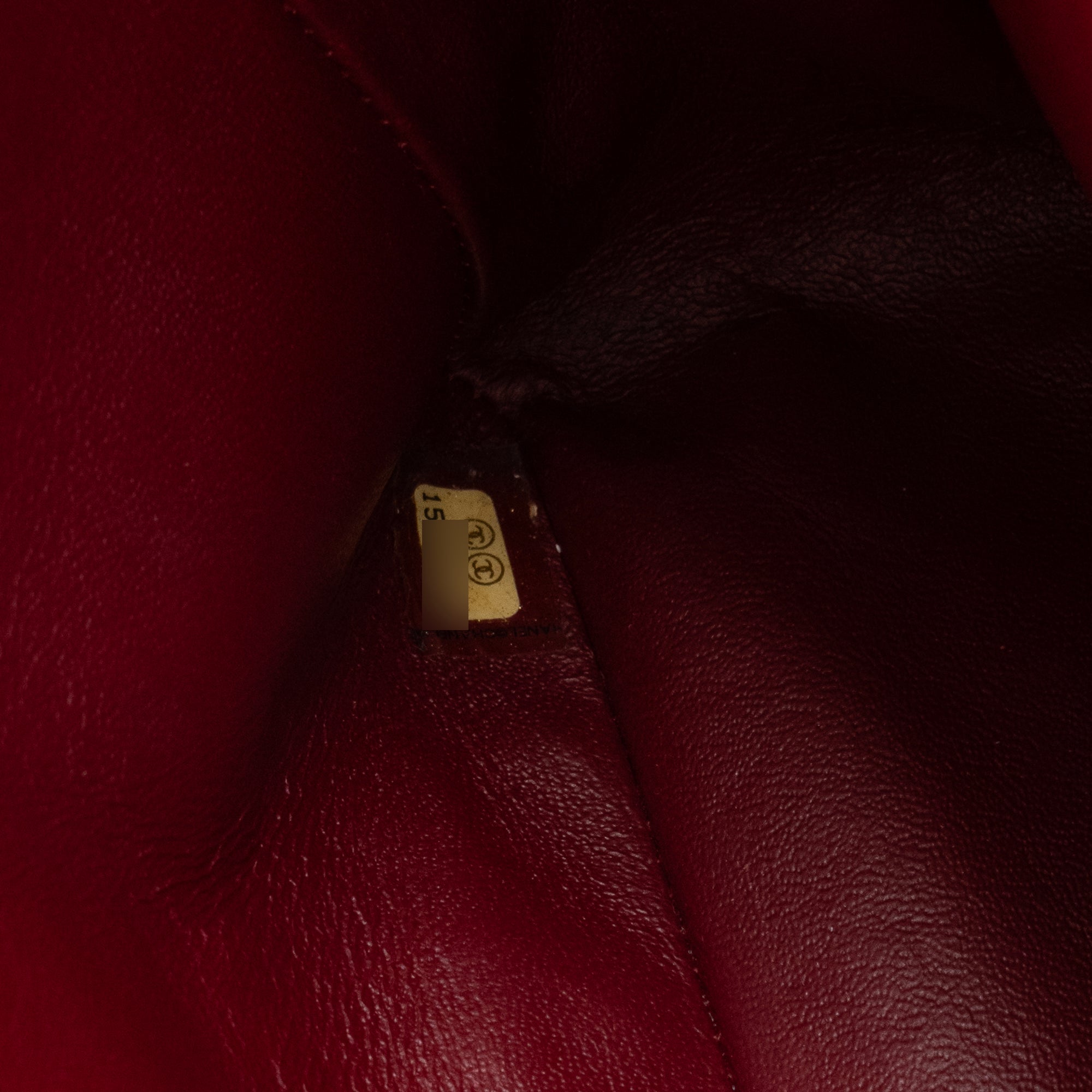 CHANEL - Sac à main Classique/Timeless Jumbo Chanel en cuir verni rouge bordeaux