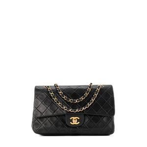 CHANEL - Sac à main Classique/Timeless 11.12 Chanel en cuir matelassé noir vintage