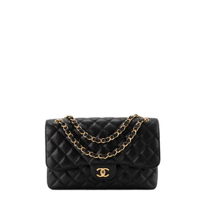CHANEL - Sac à bandoulière Classique/Timeless Jumbo Chanel en cuir caviar noir