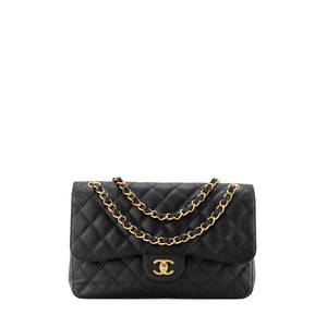 CHANEL - Sac à bandoulière Classique/Timeless Jumbo Chanel en cuir caviar noir