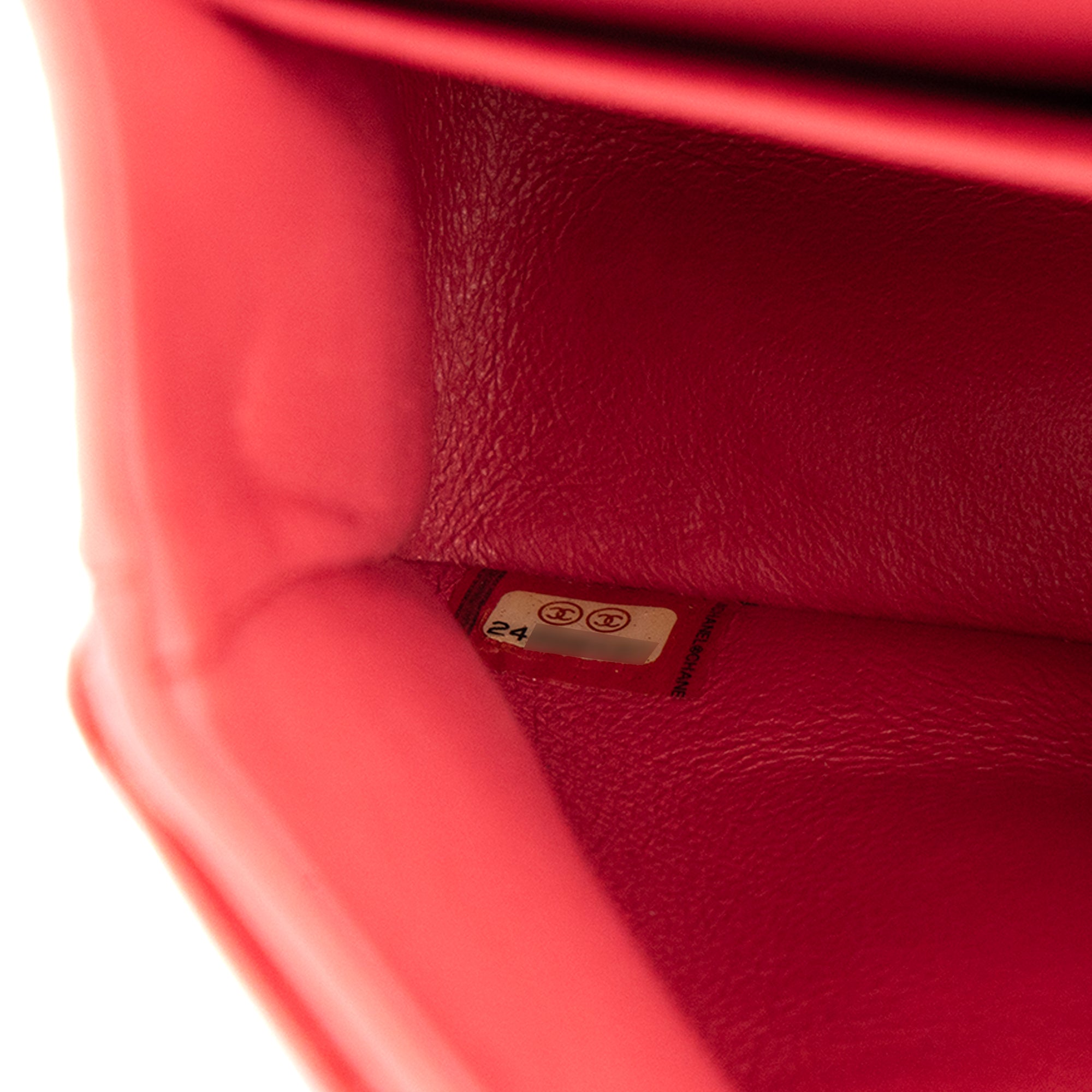 CHANEL - Sac à main Classique/Timeless Chanel en cuir chevron rose