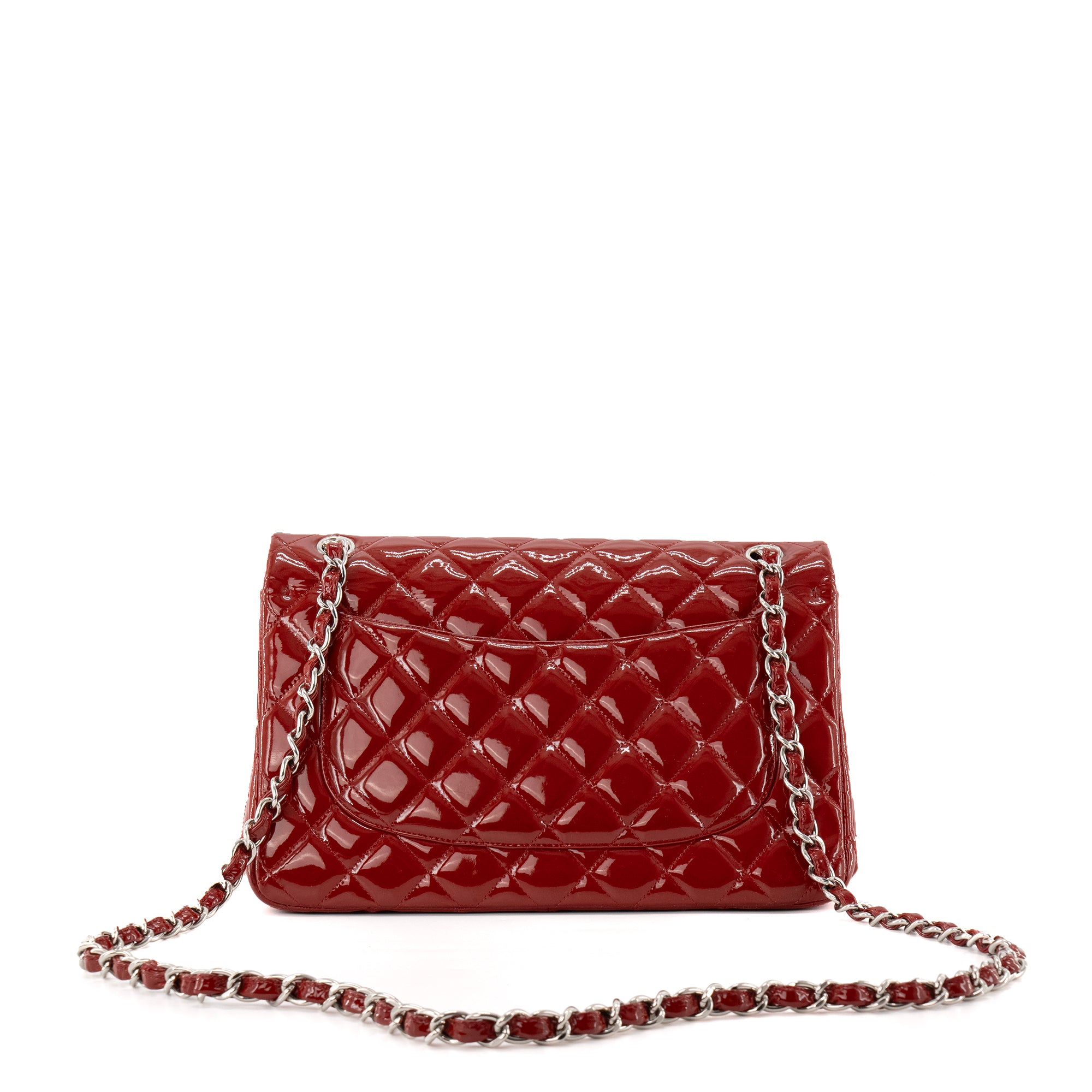 CHANEL - Sac à bandoulière Classique/Timeless Jumbo Chanel en cuir verni bordeaux