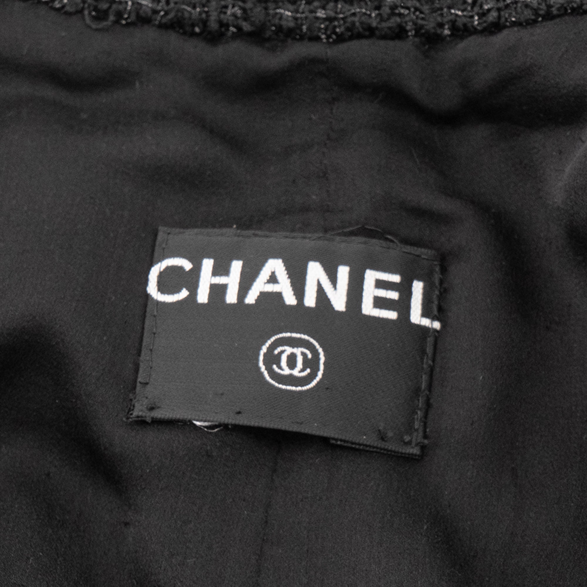 CHANEL - Veste Chanel en tweed noir irisé (T32)