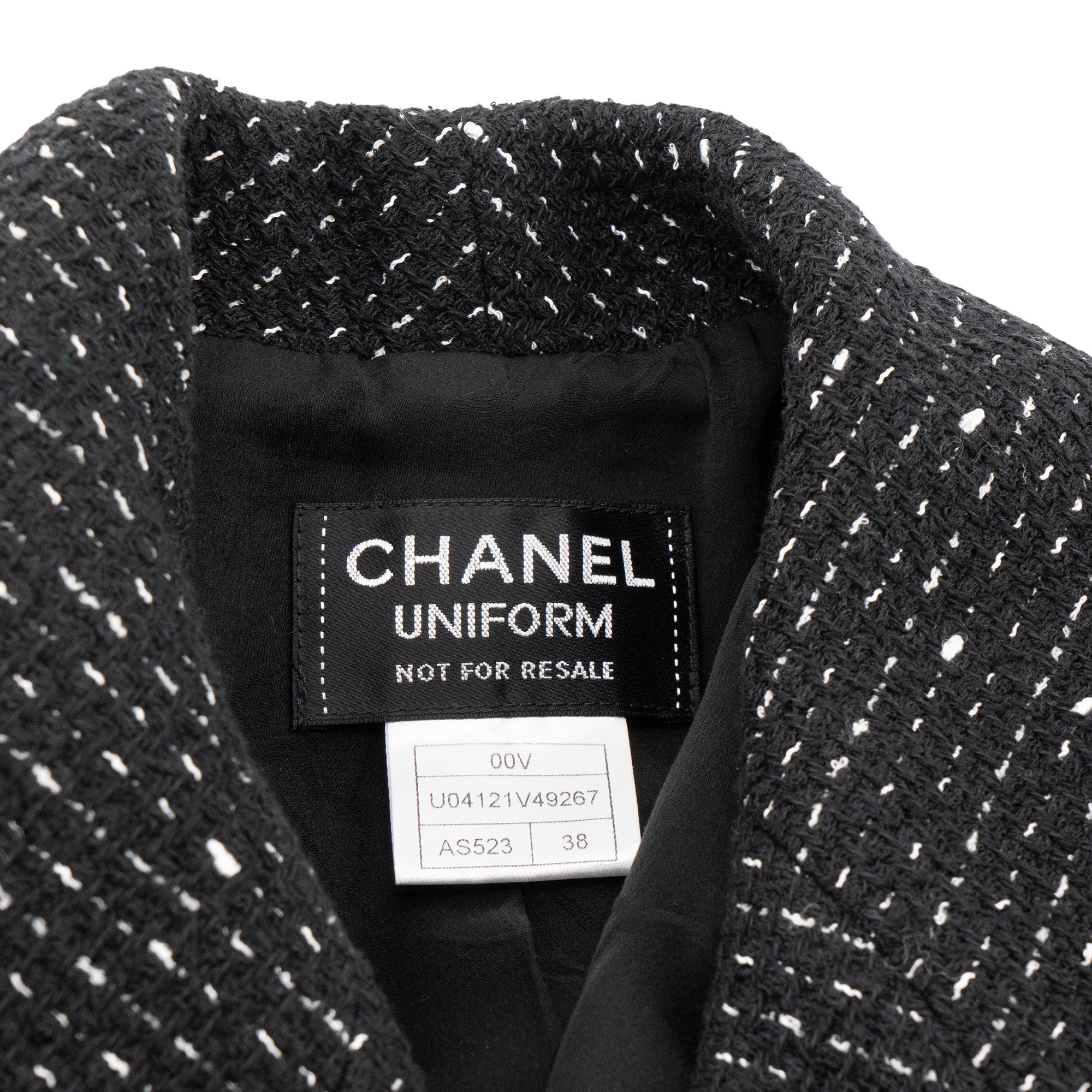 CHANEL - Veste Uniform Chanel en tweed noire (T38)