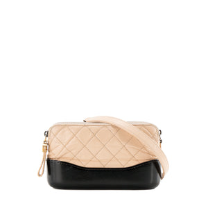 CHANEL - Sac à bandoulière Wallet on chain Gabrielle Chanel en cuir beige et noir