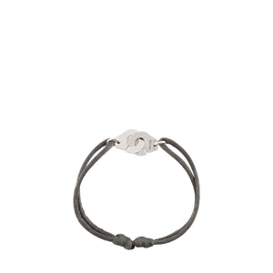 DINH VAN - Bracelet Menottes PM Dinh Van en or blanc et cordon gris