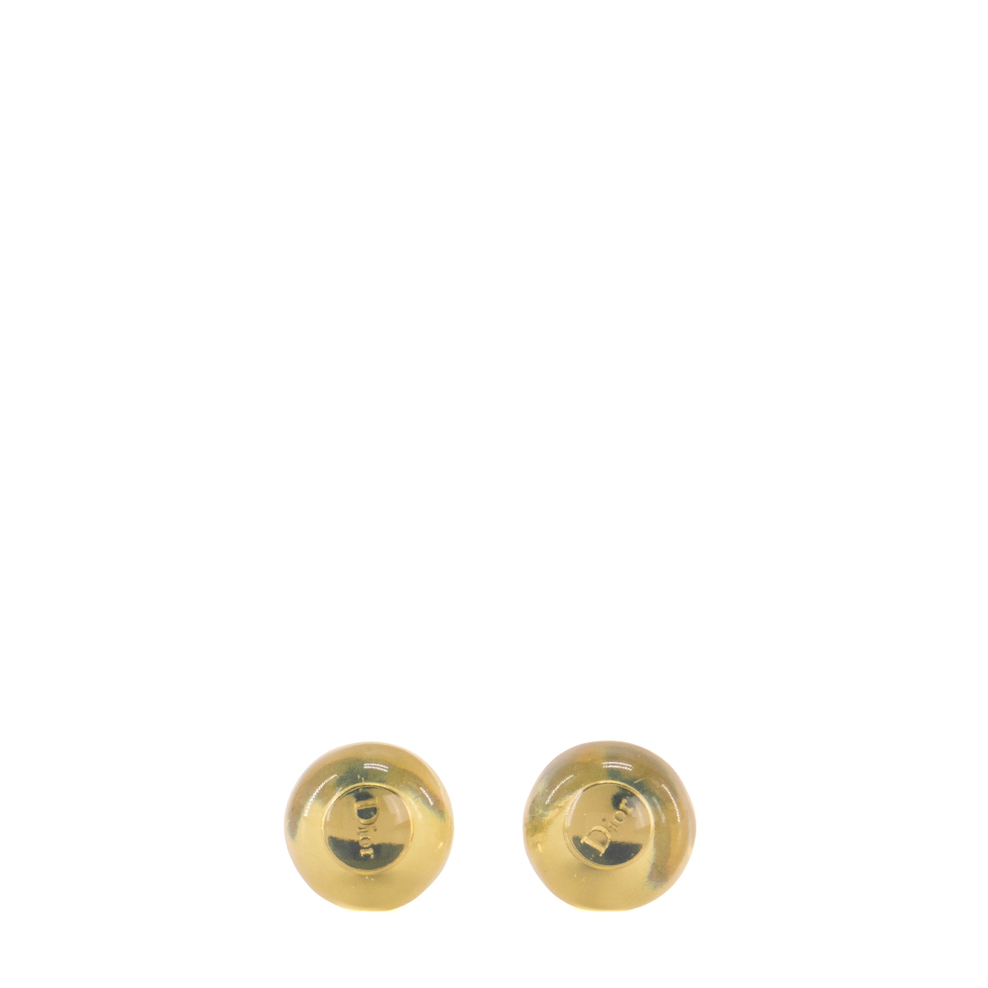 DIOR - Boucles d'oreilles Tribales Dior en métal argenté et résine jaune