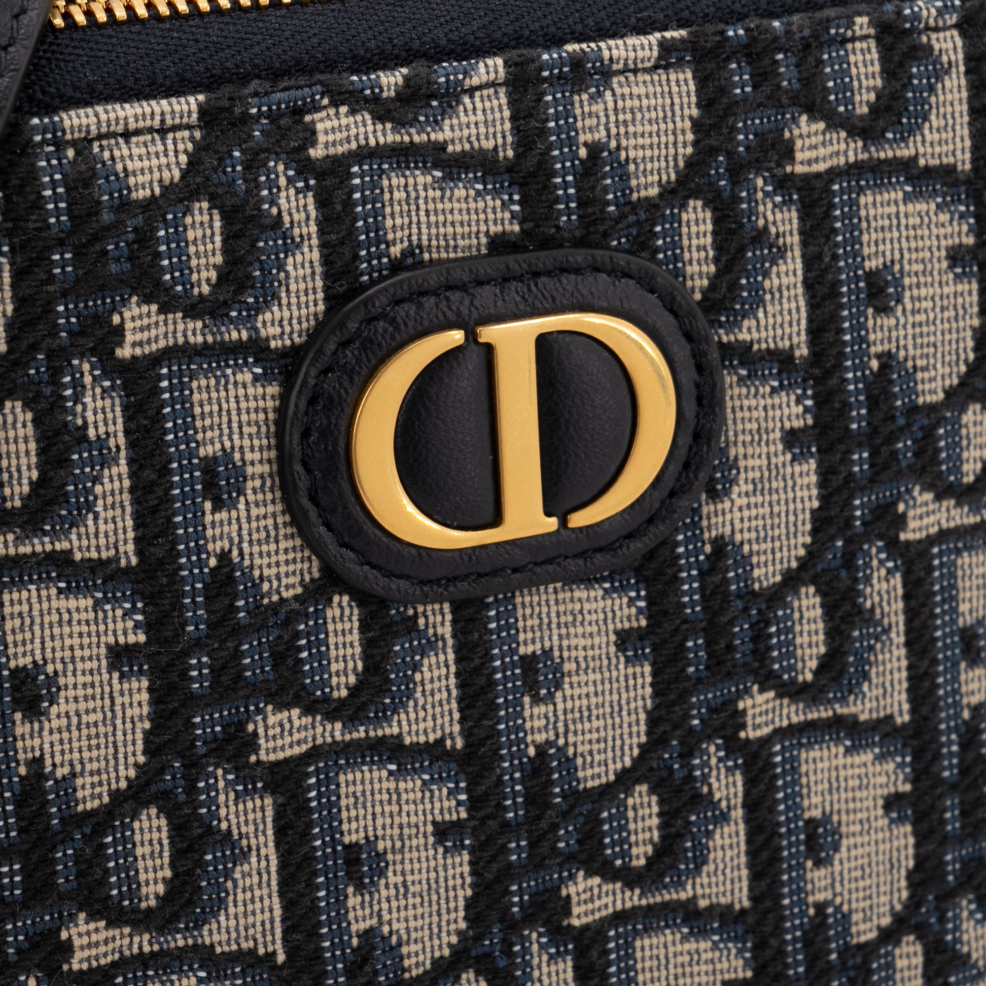 DIOR - Sac à bandoulière 30 Montaigne Pouch Dior en toile Dior Oblique bleu marine et beige