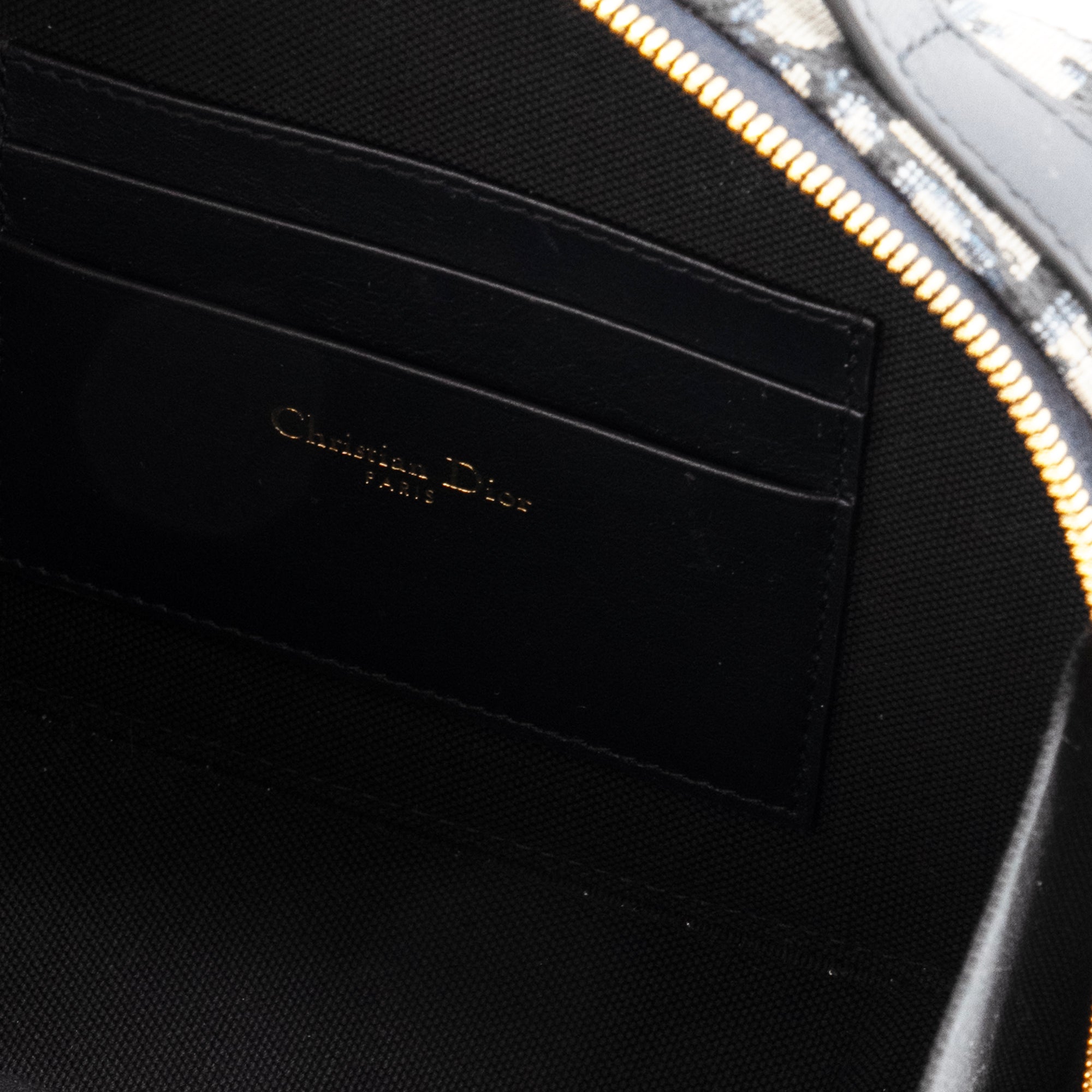 DIOR - Sac à bandoulière 30 Montaigne Pouch Dior en toile Dior Oblique bleu marine et beige