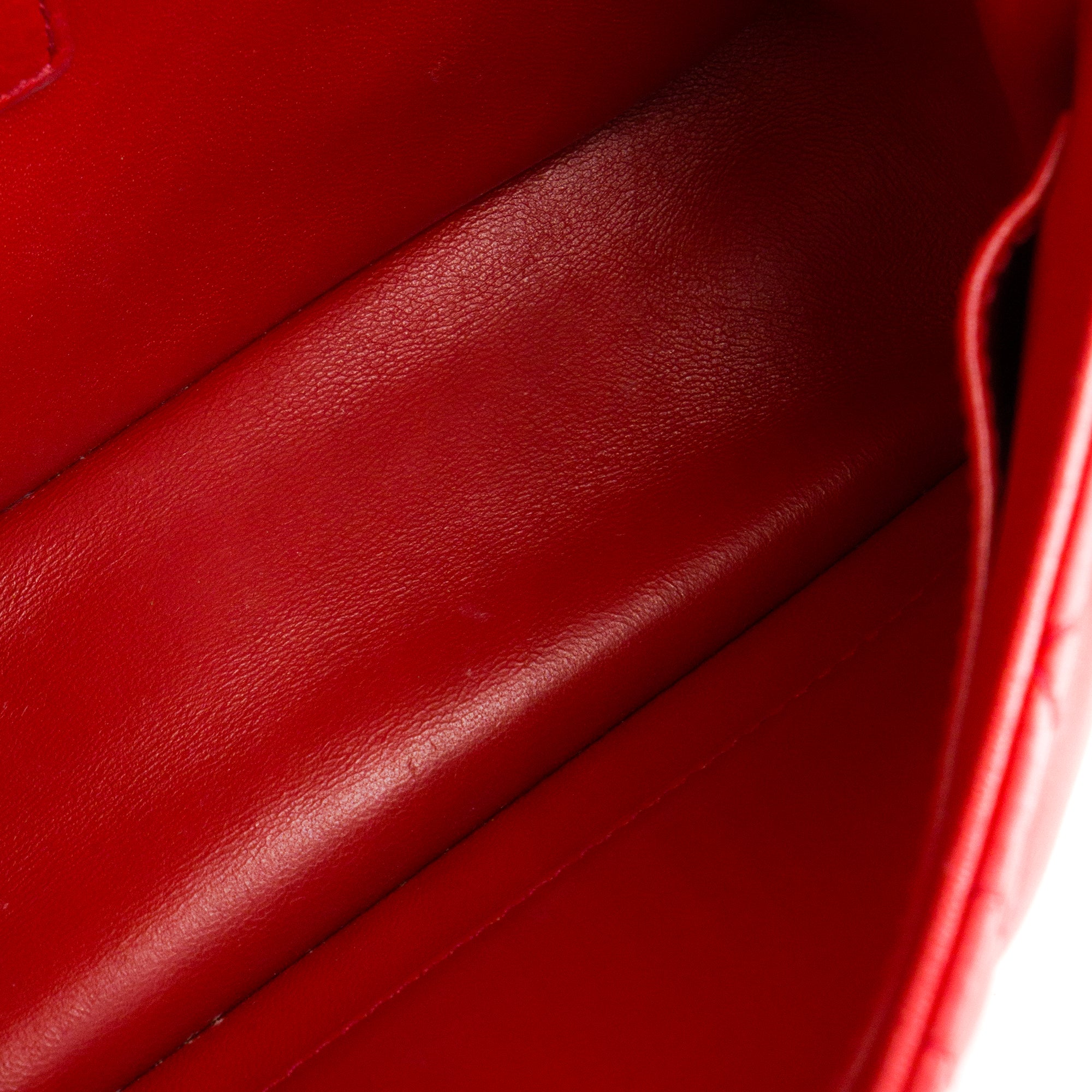 DIOR - Sac à bandoulière Caro Dior en cuir cannage rouge