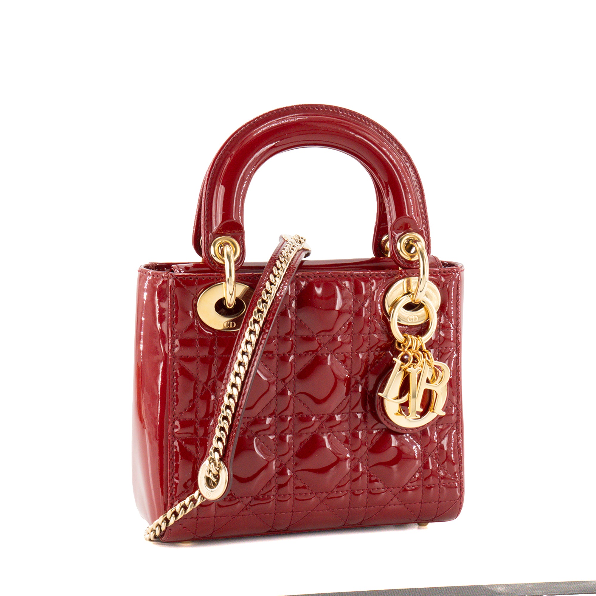 DIOR - Sac à bandoulière Lady Dior Mini en cuir cannage verni bordeaux
