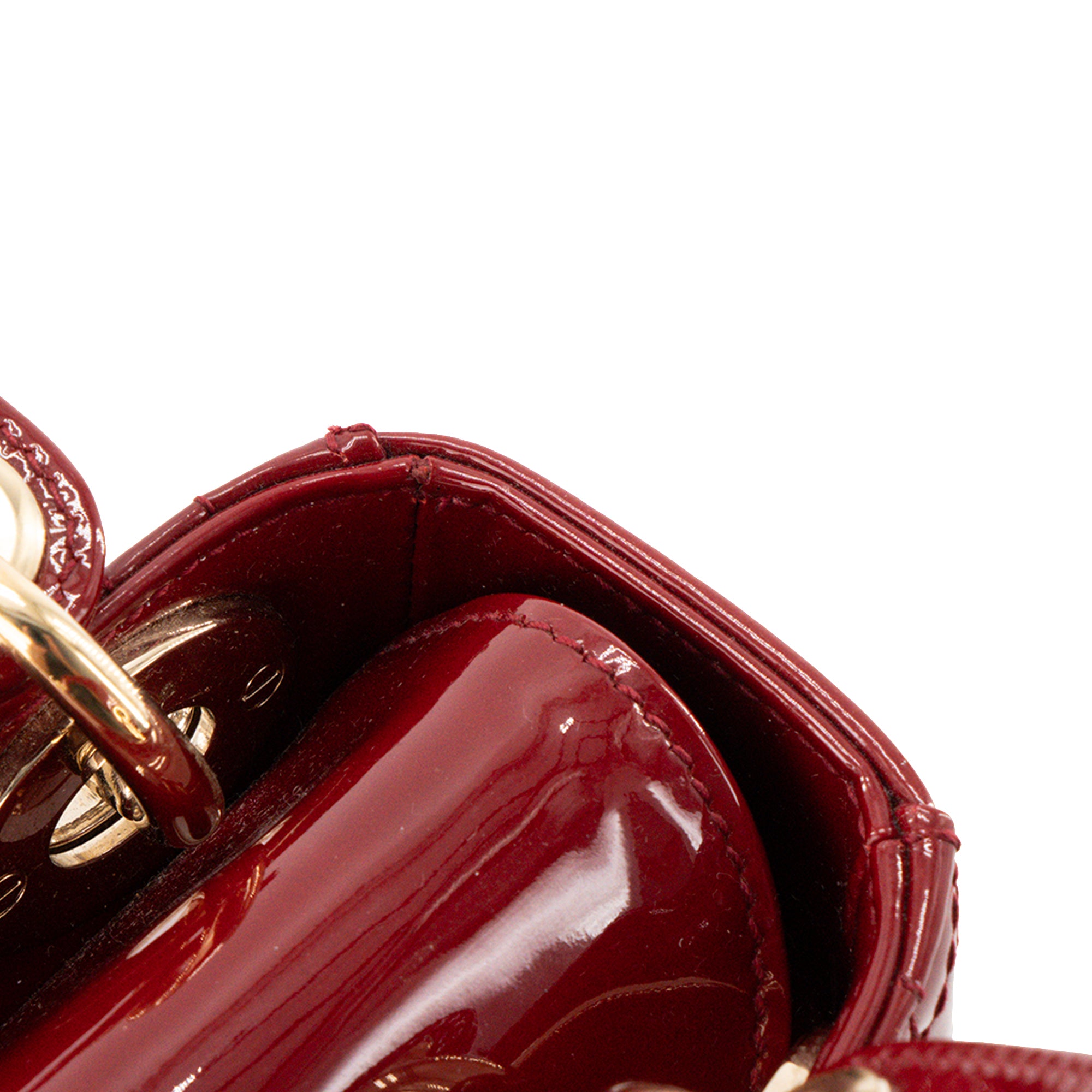 DIOR - Sac à bandoulière Lady Dior mini en cuir cannage verni rouge