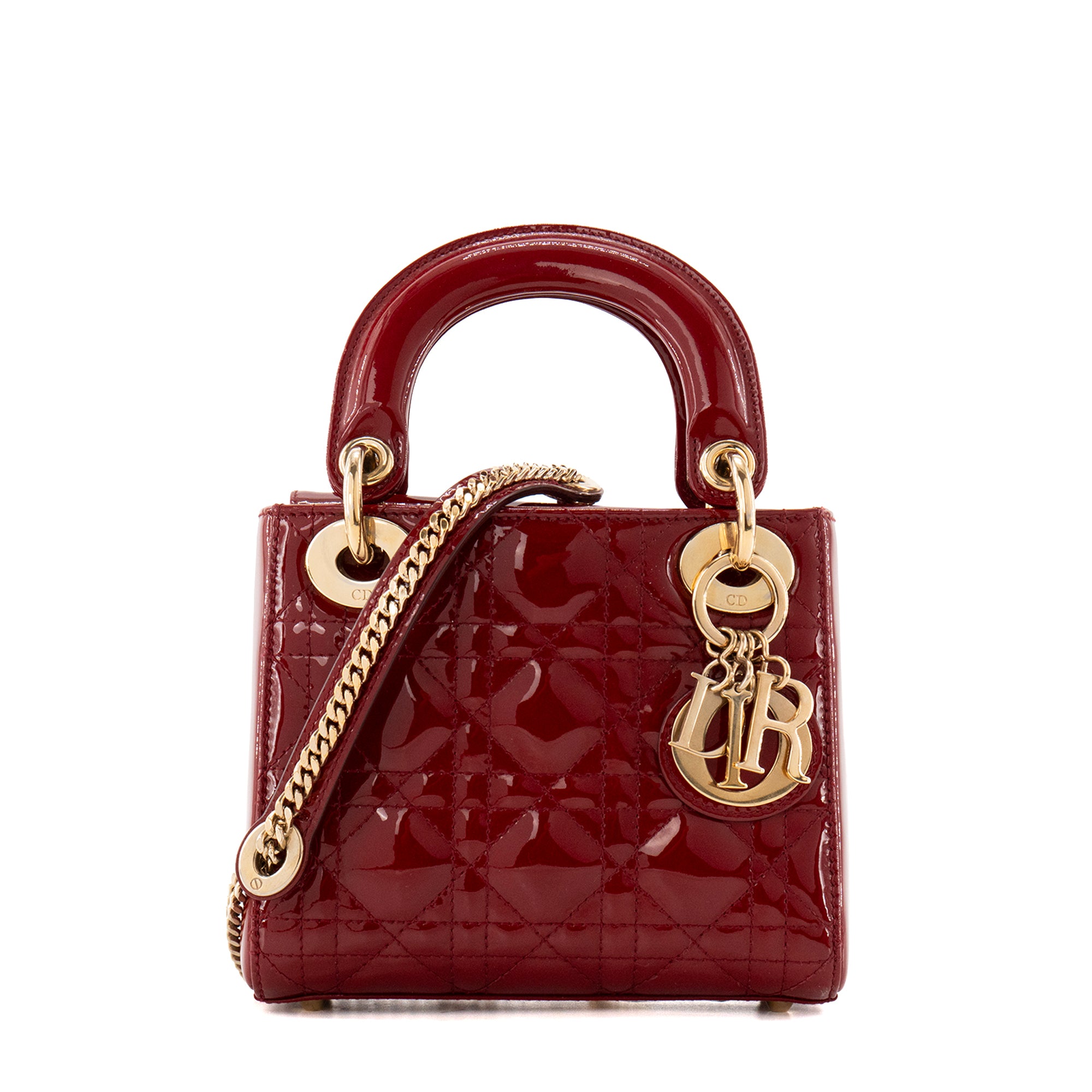 DIOR - Sac à bandoulière Lady Dior mini en cuir cannage verni bordeaux