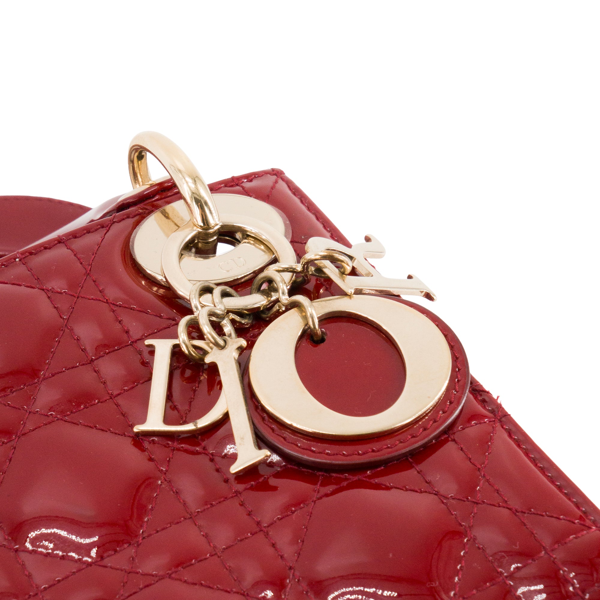 DIOR - Sac à bandoulière Lady Dior mini en cuir cannage verni rouge