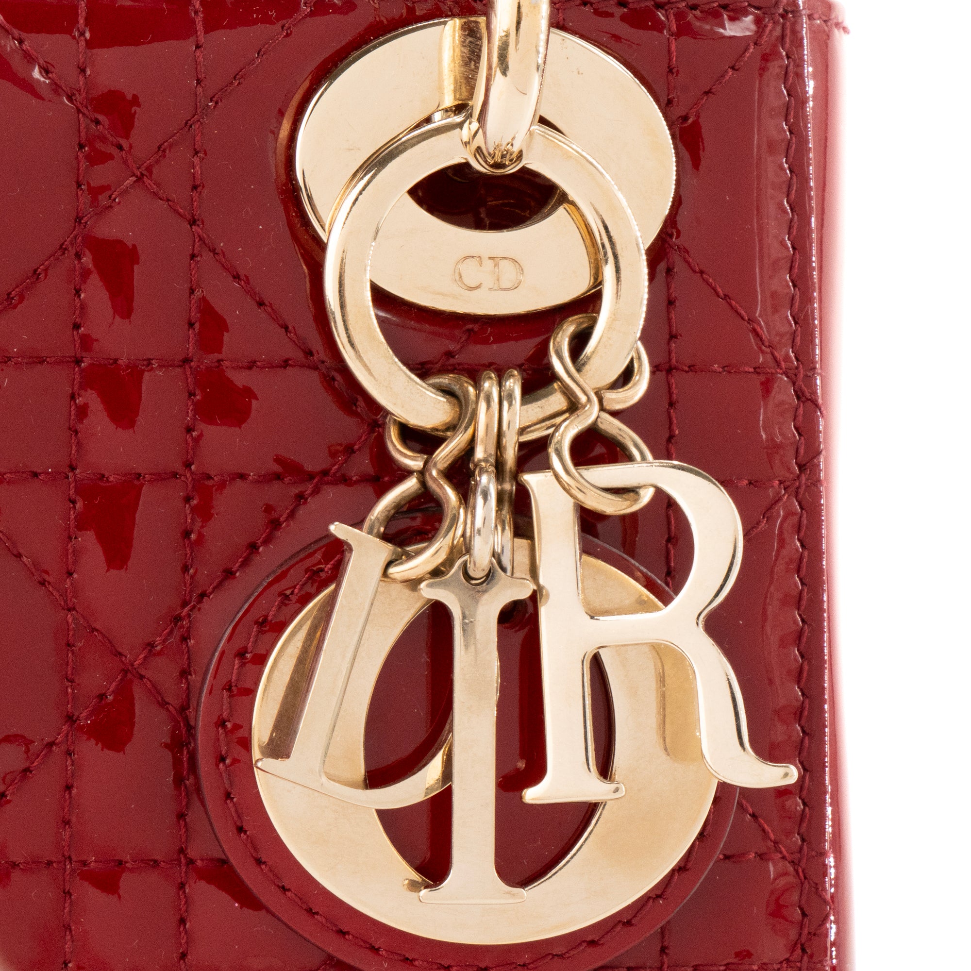 DIOR - Sac à bandoulière Lady Dior Mini en cuir cannage verni rouge