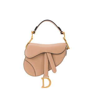 DIOR - Sac à main Saddle Micro Dior en cuir grainé rose ancien