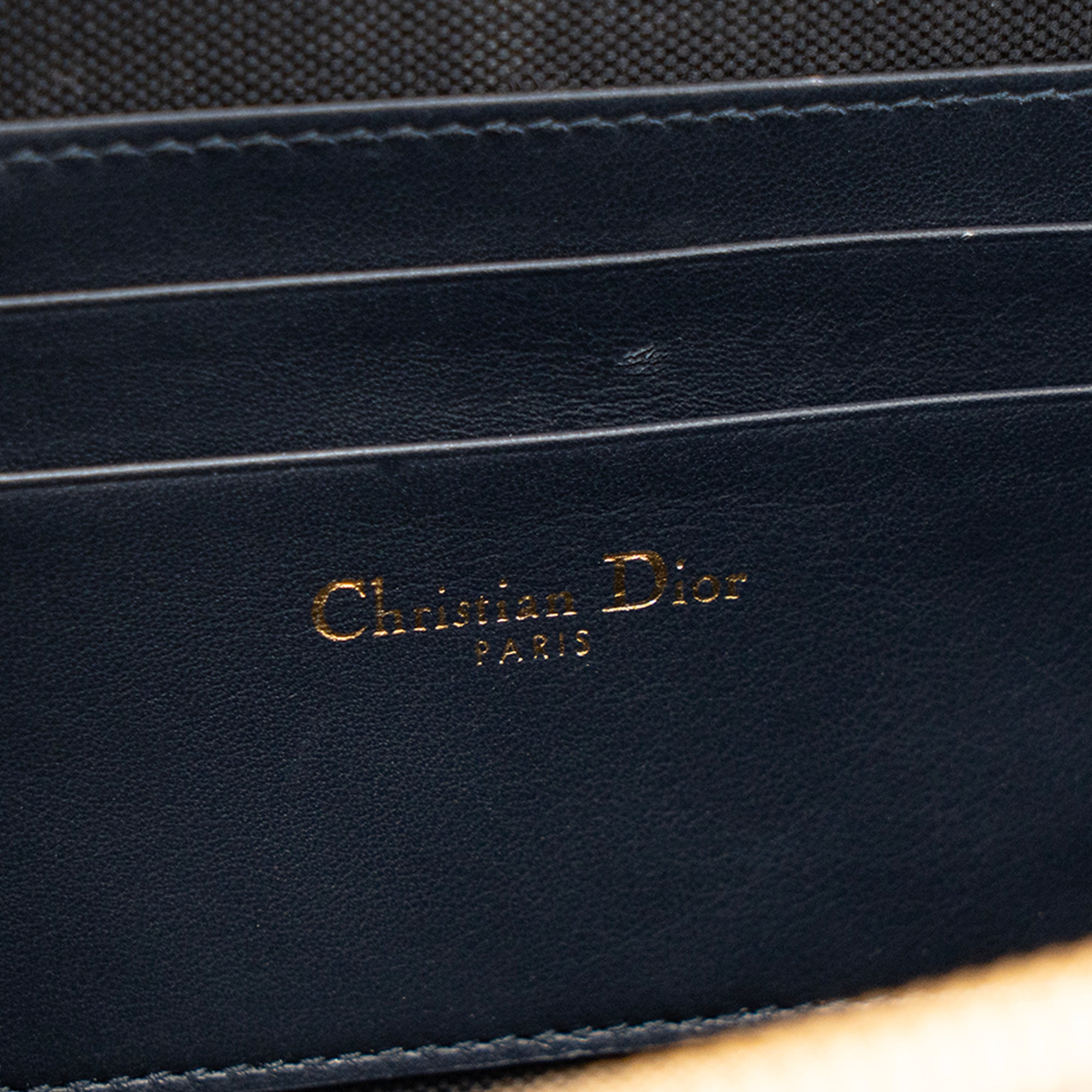 DIOR - Sac à bandoulière 30 Montaigne Pouch Dior en toile Dior Oblique bleu marine et beige