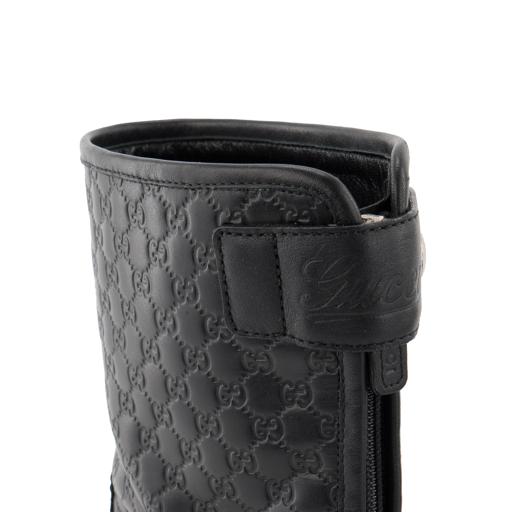 GUCCI - Bottines Gucci en cuir embossé monogrammé noir (T38.5)