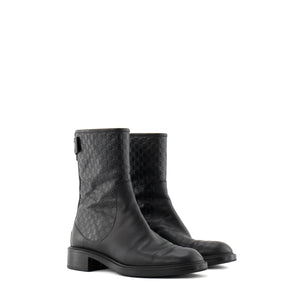 GUCCI - Bottines Gucci en cuir embossé monogrammé noir (T38.5)