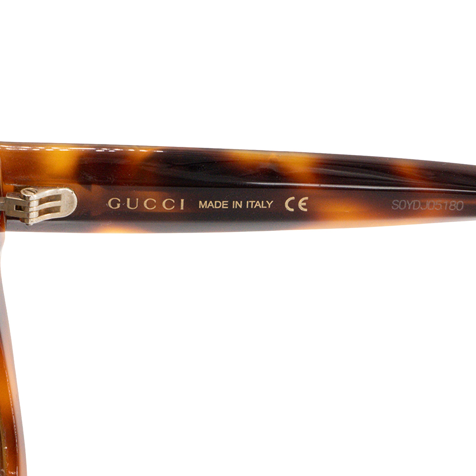 GUCCI - Lunettes de soleil Gucci en écaille marron et strass