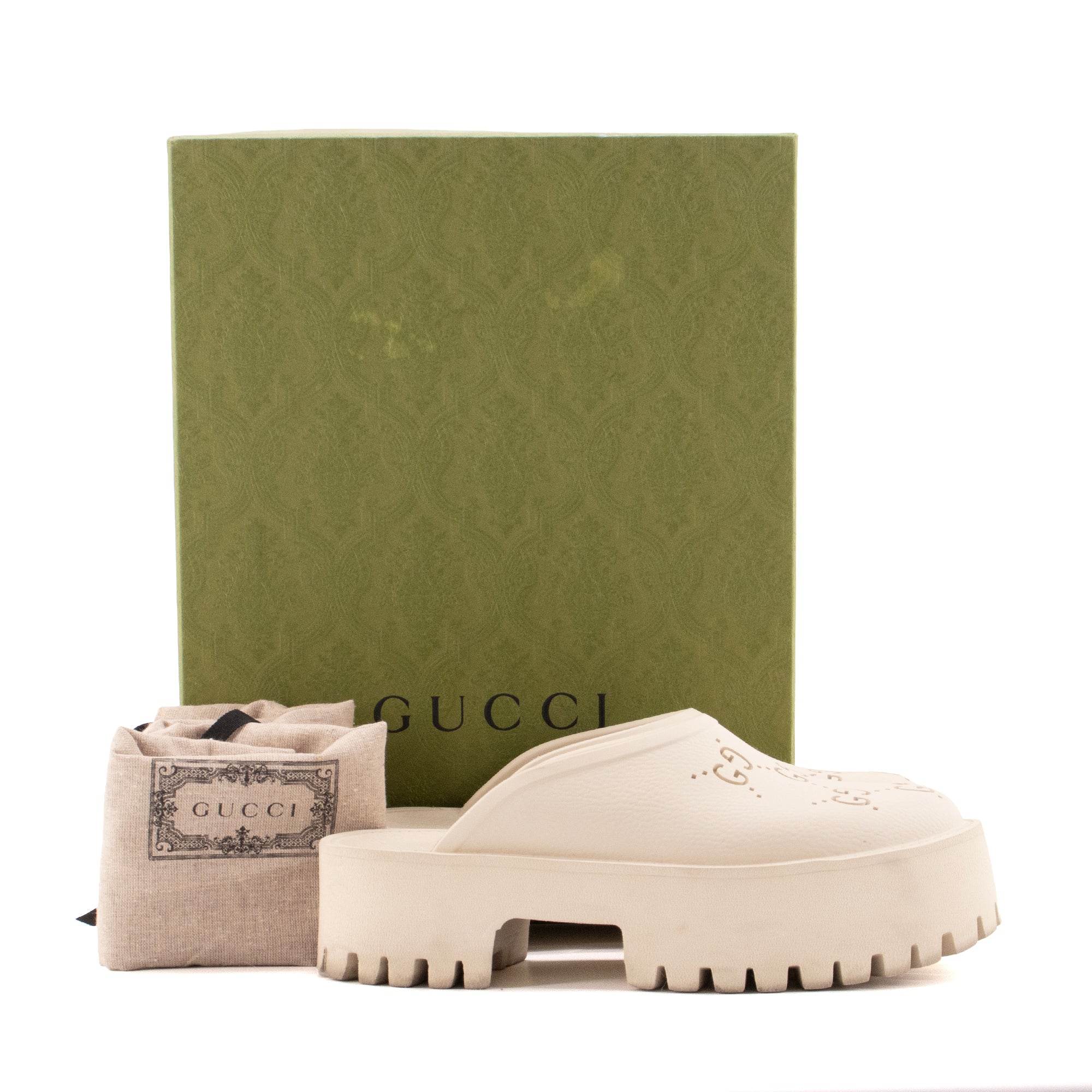 GUCCI - Mules à plateforme Gucci en caoutchouc blanc (T38)