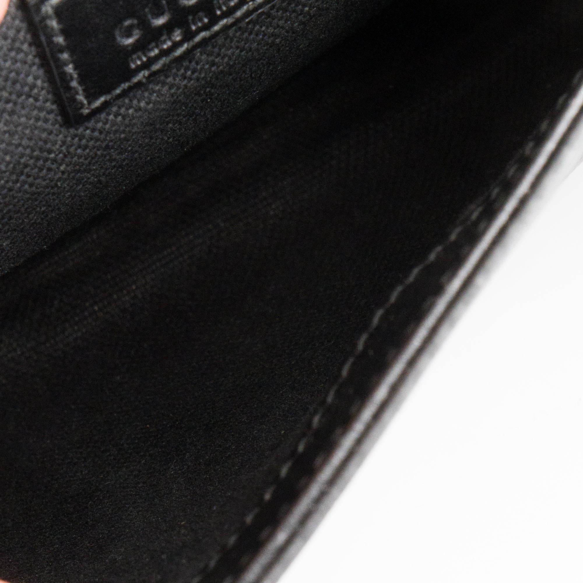 GUCCI - Sac à bandoulière GG petit format Gucci en toile enduite monogrammée noire