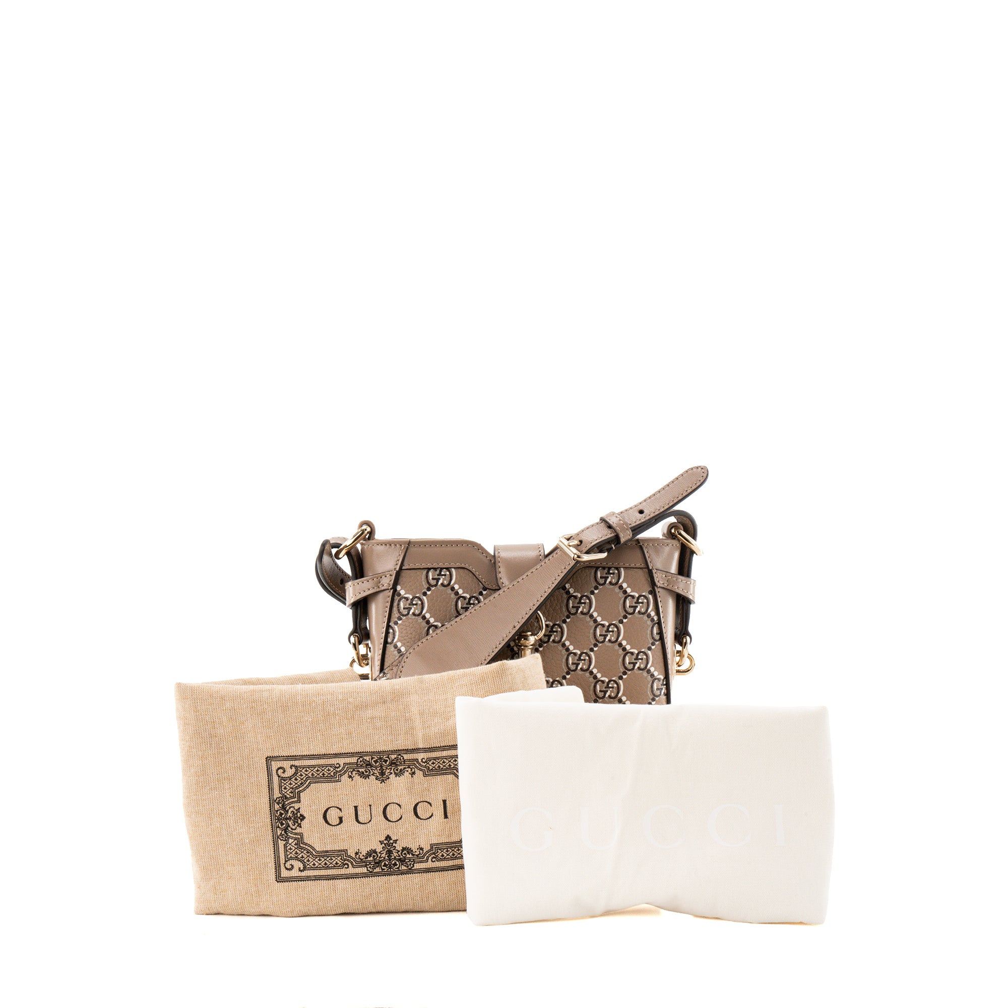 GUCCI - Sac à bandoulière GG Shadow Gucci en cuir grainé à motif monogramme taupe