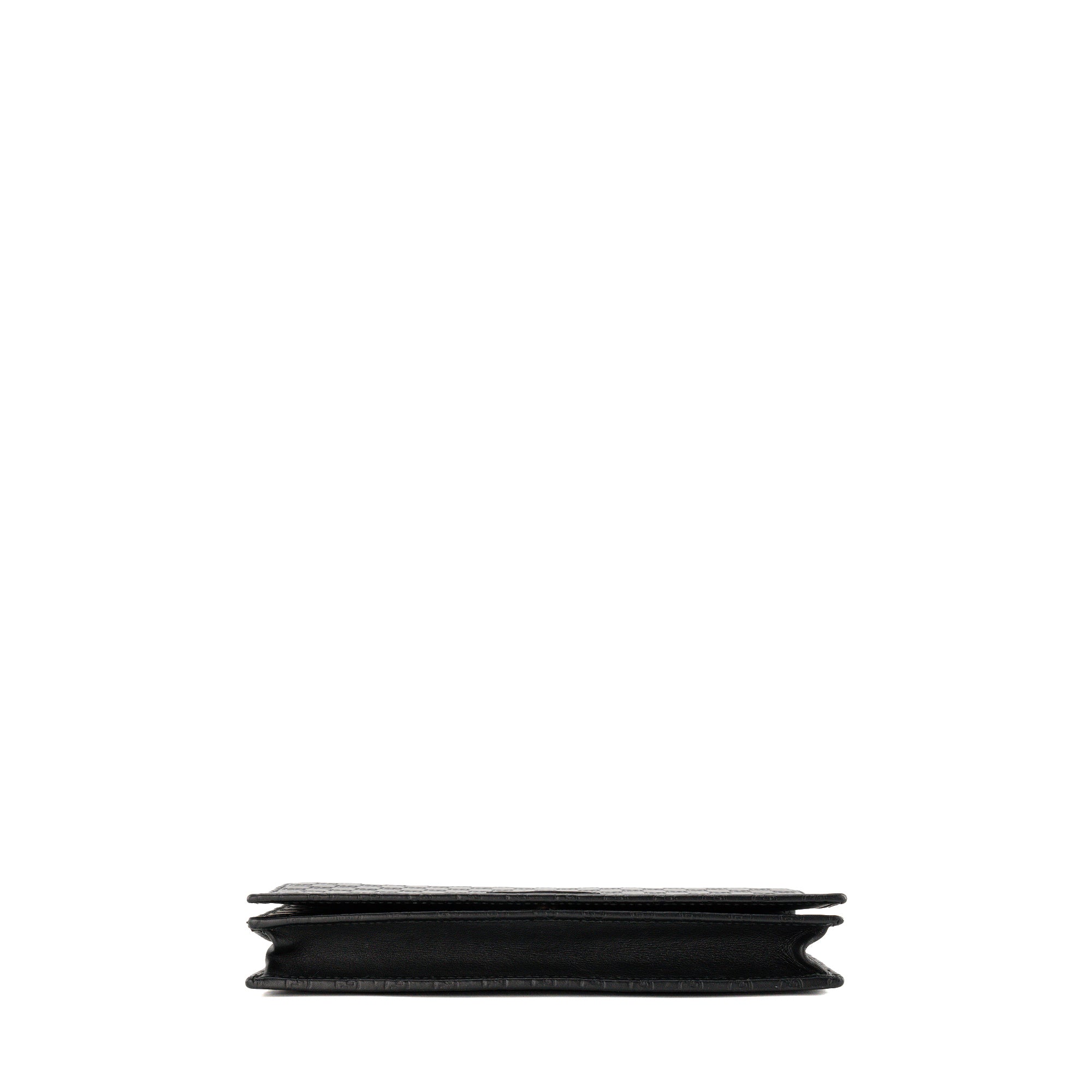 GUCCI - Sac à bandoulière Microguccissima GG Gucci en cuir embossé noir