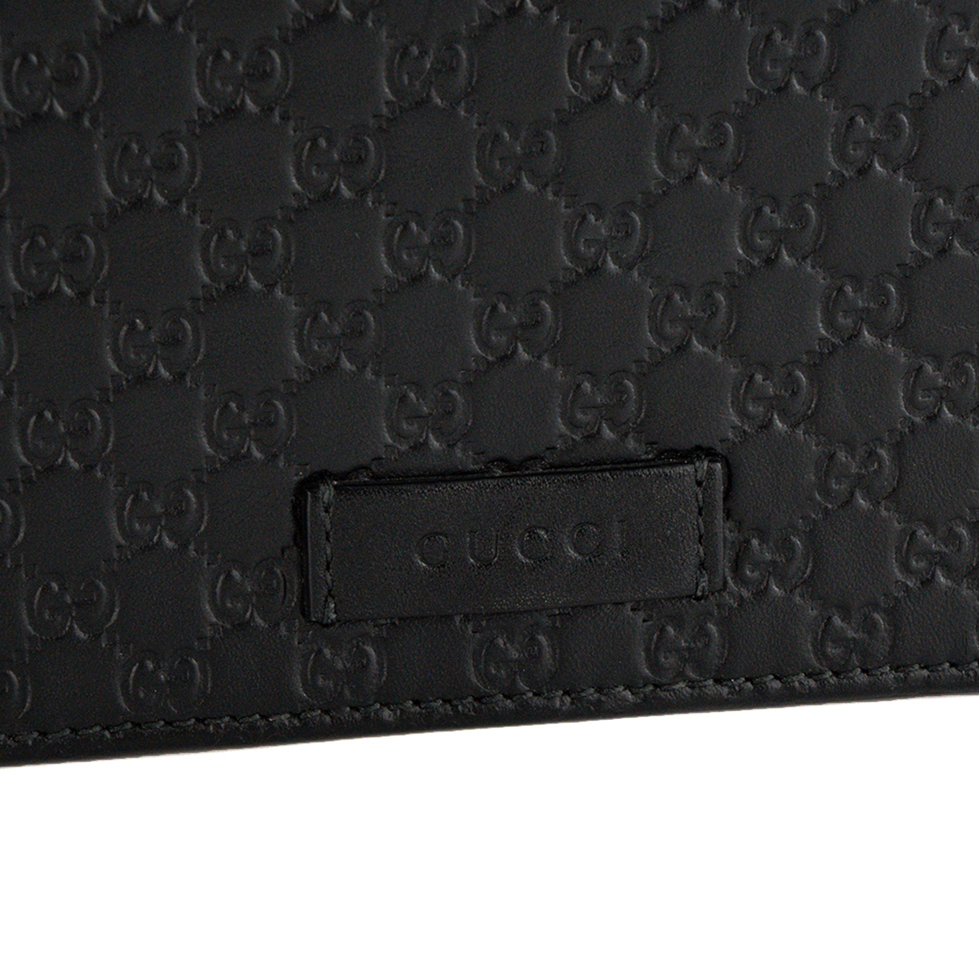 GUCCI - Sac à bandoulière Microguccissima GG Gucci en cuir embossé noir