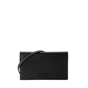 GUCCI - Sac à bandoulière Microguccissima GG Gucci en cuir embossé noir