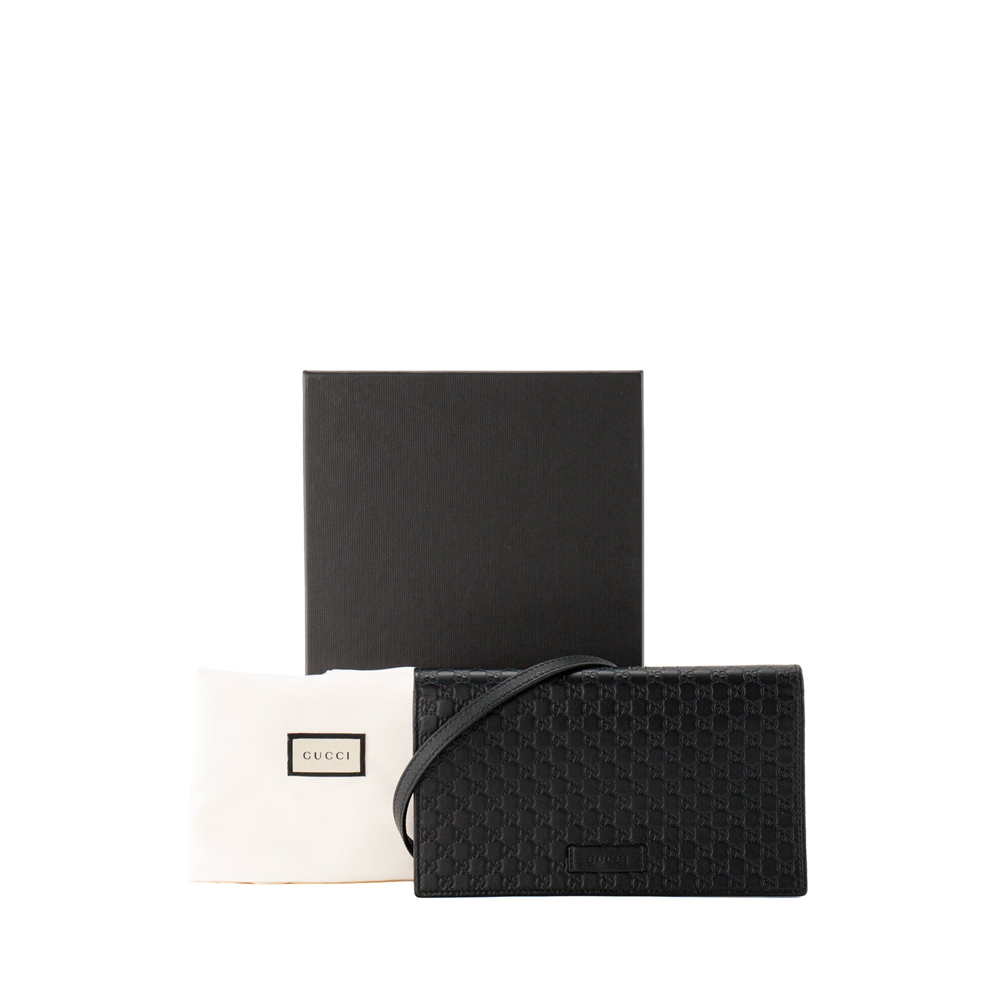 GUCCI - Sac à bandoulière Microguccissima GG Gucci en cuir embossé noir