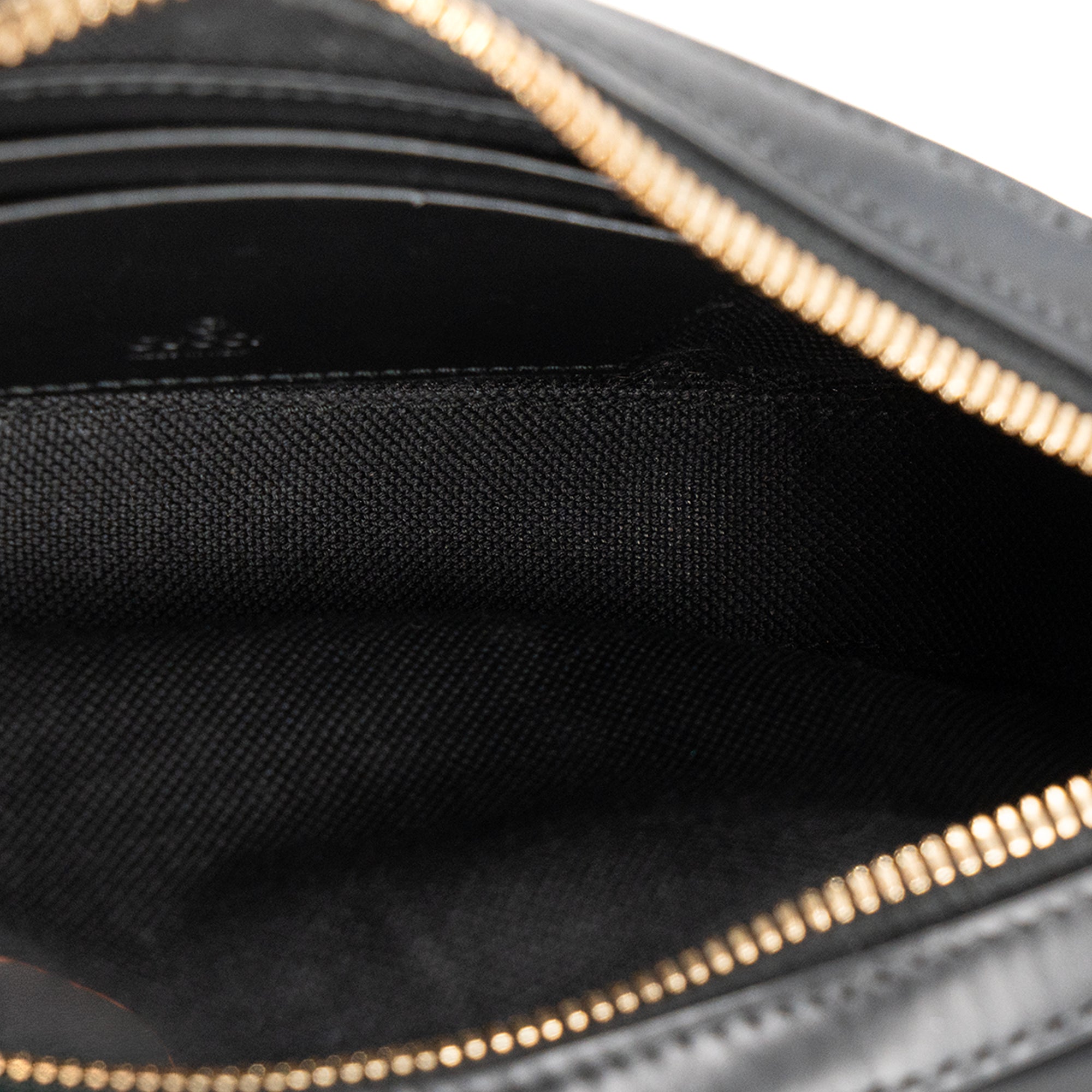 GUCCI - Sac à bandoulière Gilbert Gucci en cuir embossé noir