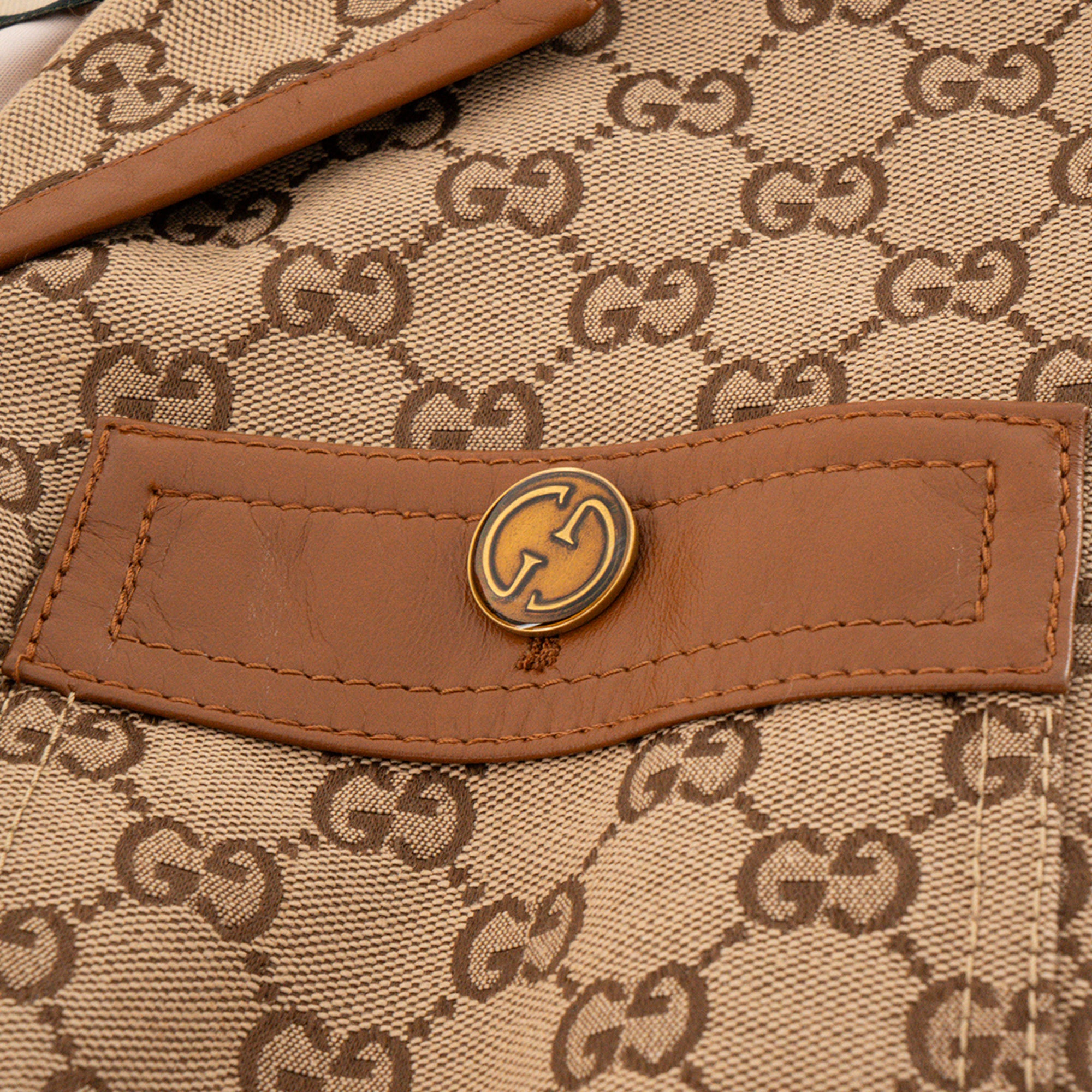 GUCCI - Veste longue Horsebit Gucci en cuir et toile monogrammée (T38)