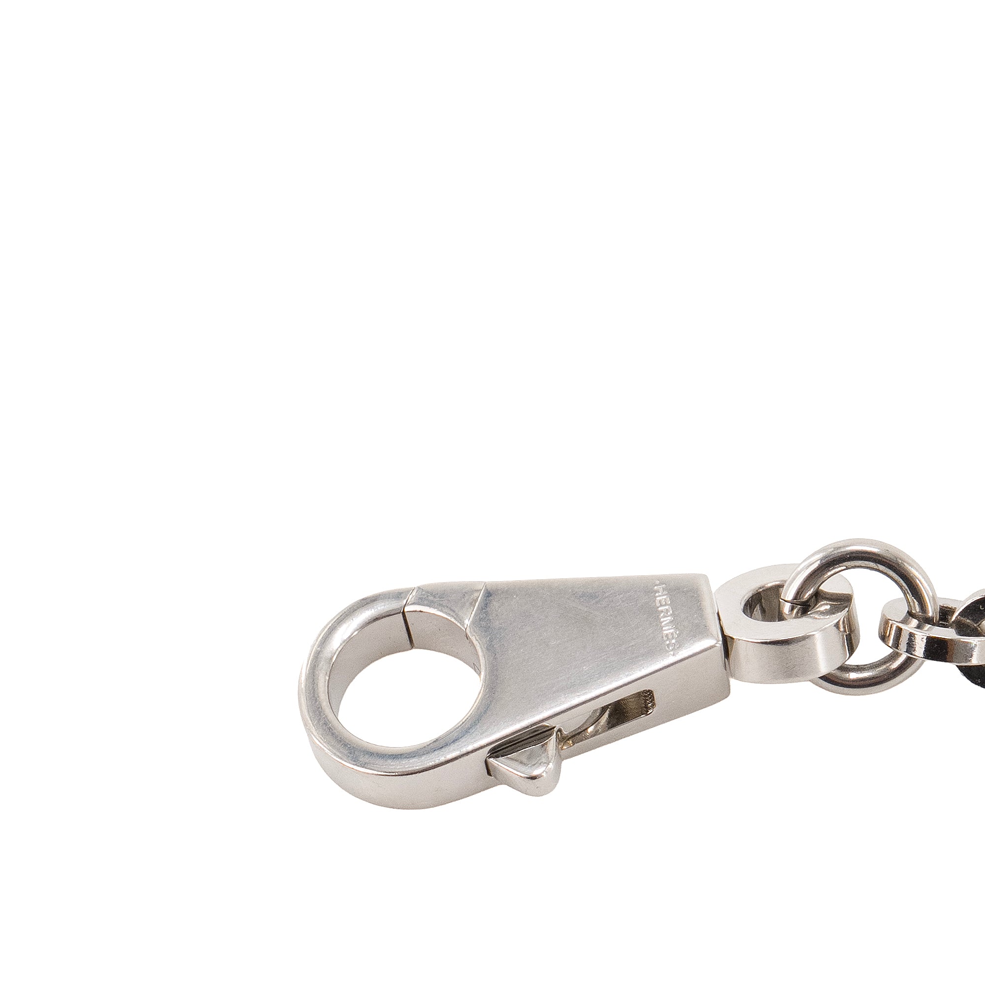 HERMÈS - Accessoire de sac Kelly Hermès en métal argenté