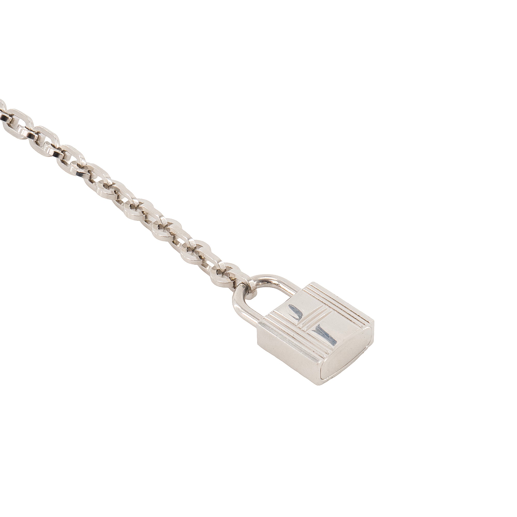 HERMÈS - Accessoire de sac Kelly Hermès en métal argenté