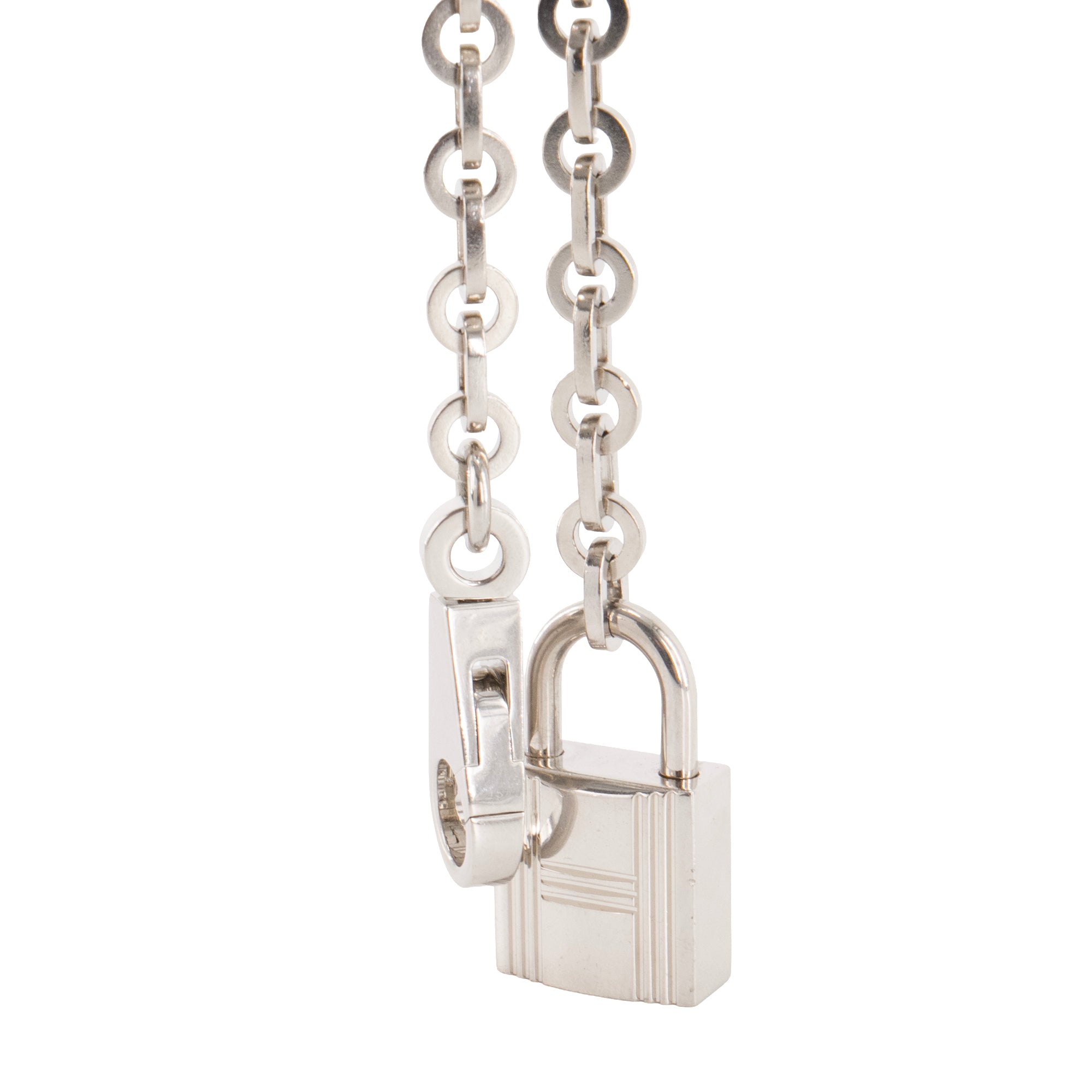 HERMÈS - Accessoire de sac Kelly Hermès en métal argenté