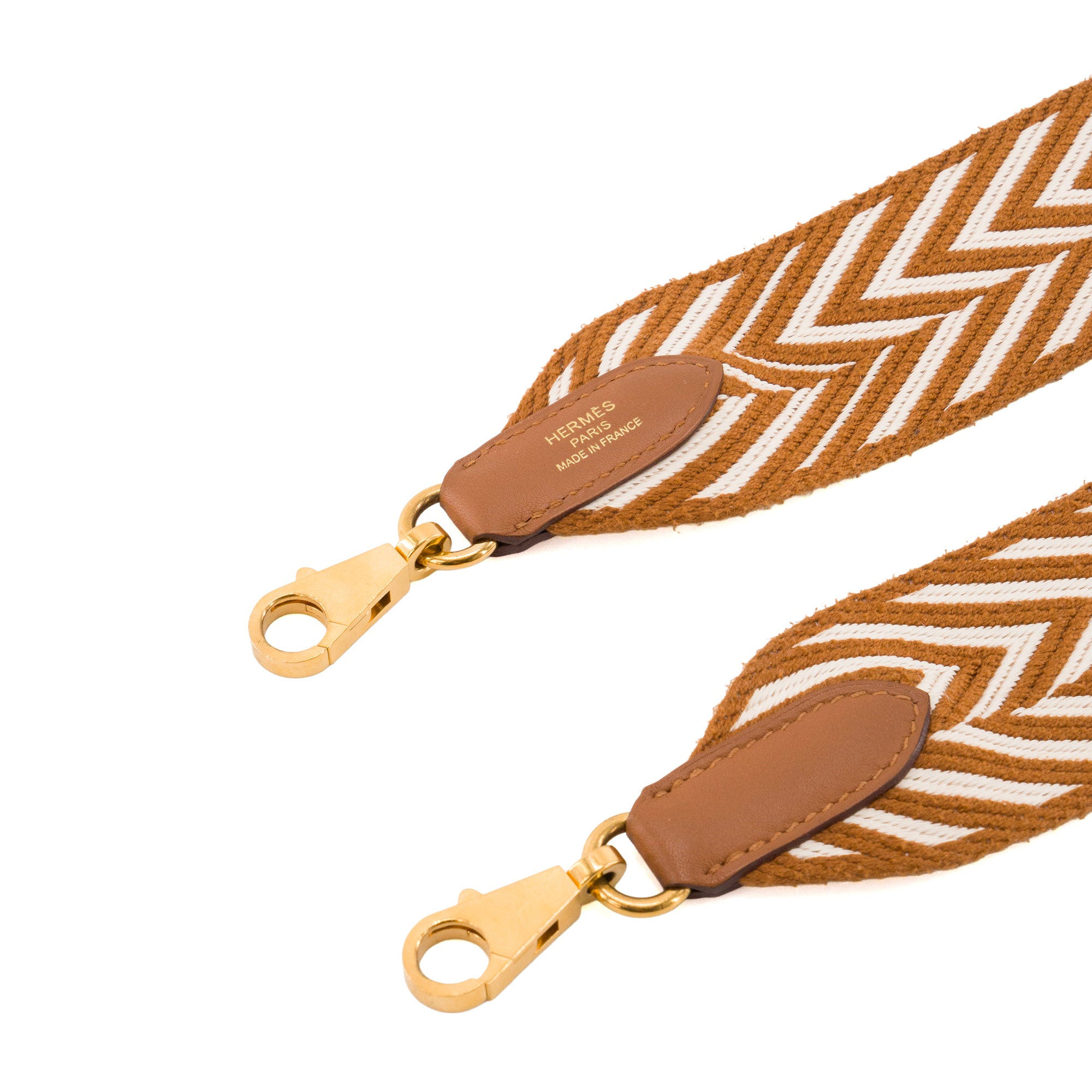 HERMÈS - Bandoulière Sangle Zigzag 50mm Hermès en toile marron gold et blanche