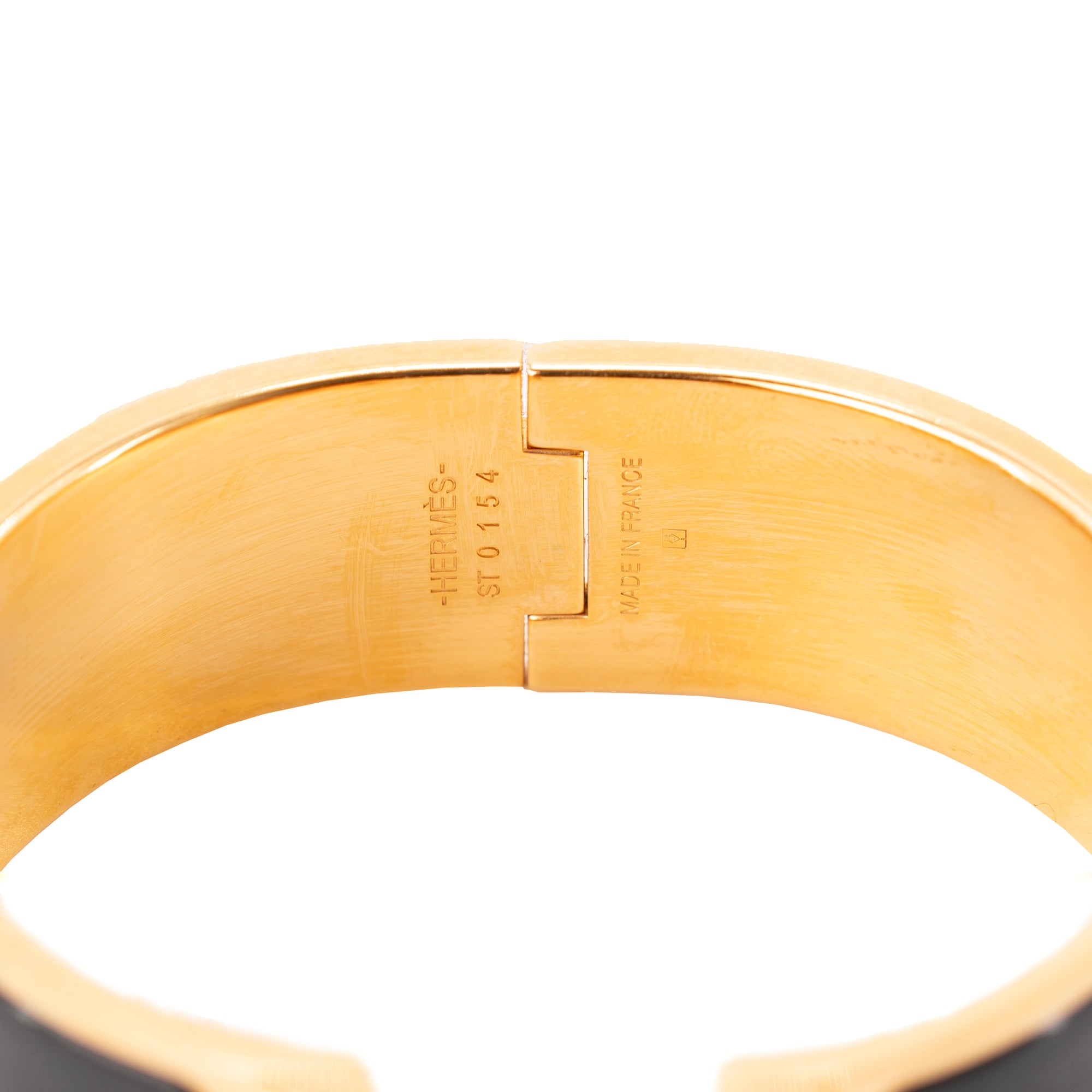 HERMÈS - Bracelet Clic Clac H Hermès en métal doré et émail noir (PM)