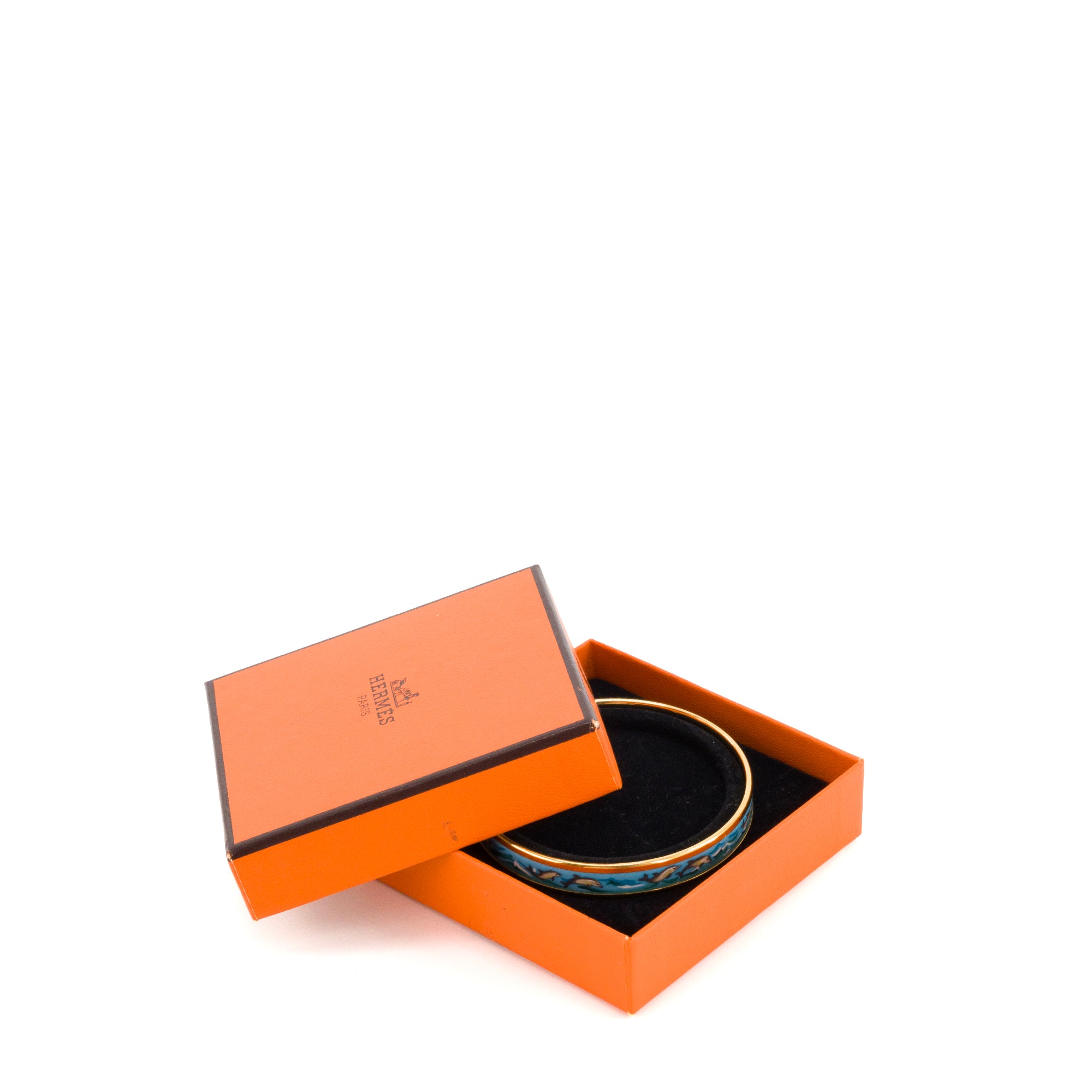 HERMÈS - Bracelet jonc Hermès en métal doré et email