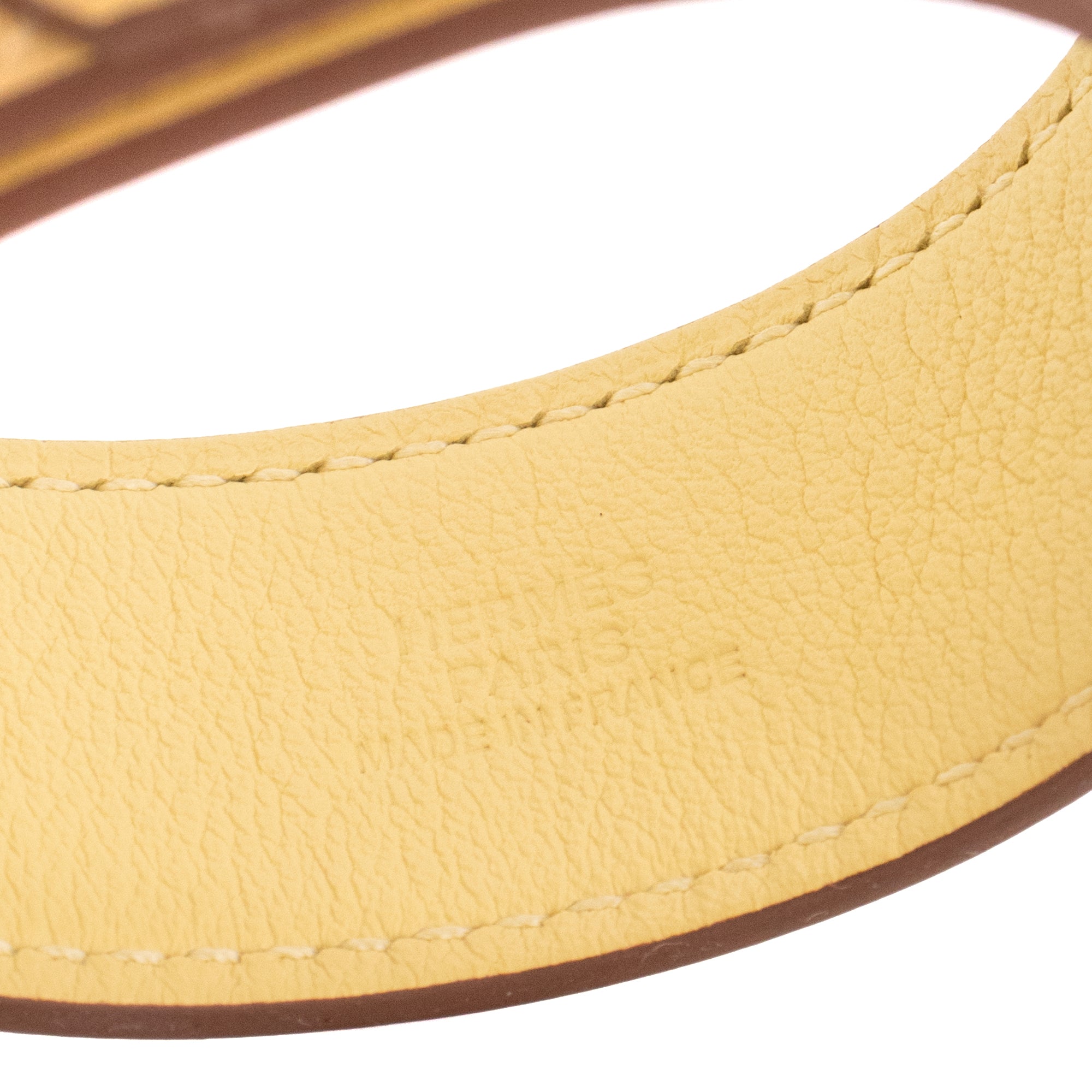 HERMÈS - Bracelet Kelly Twist PM Hermès en cuir jaune (T2)