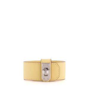 HERMÈS - Bracelet Kelly Twist PM Hermès en cuir jaune (T2)