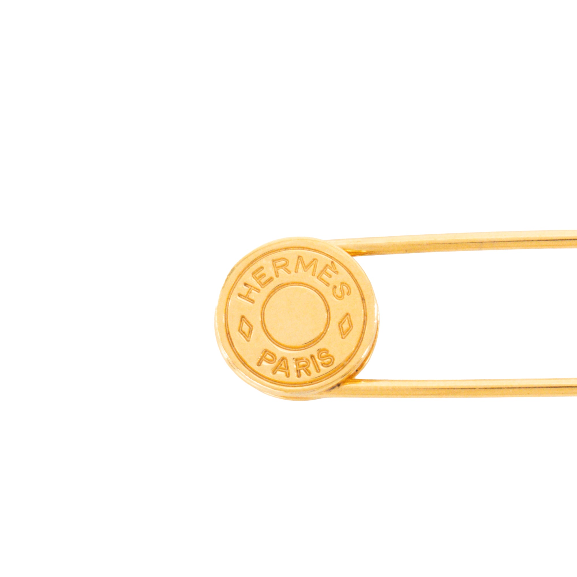 HERMÈS - Broche Clou de Selle Hermès en métal doré