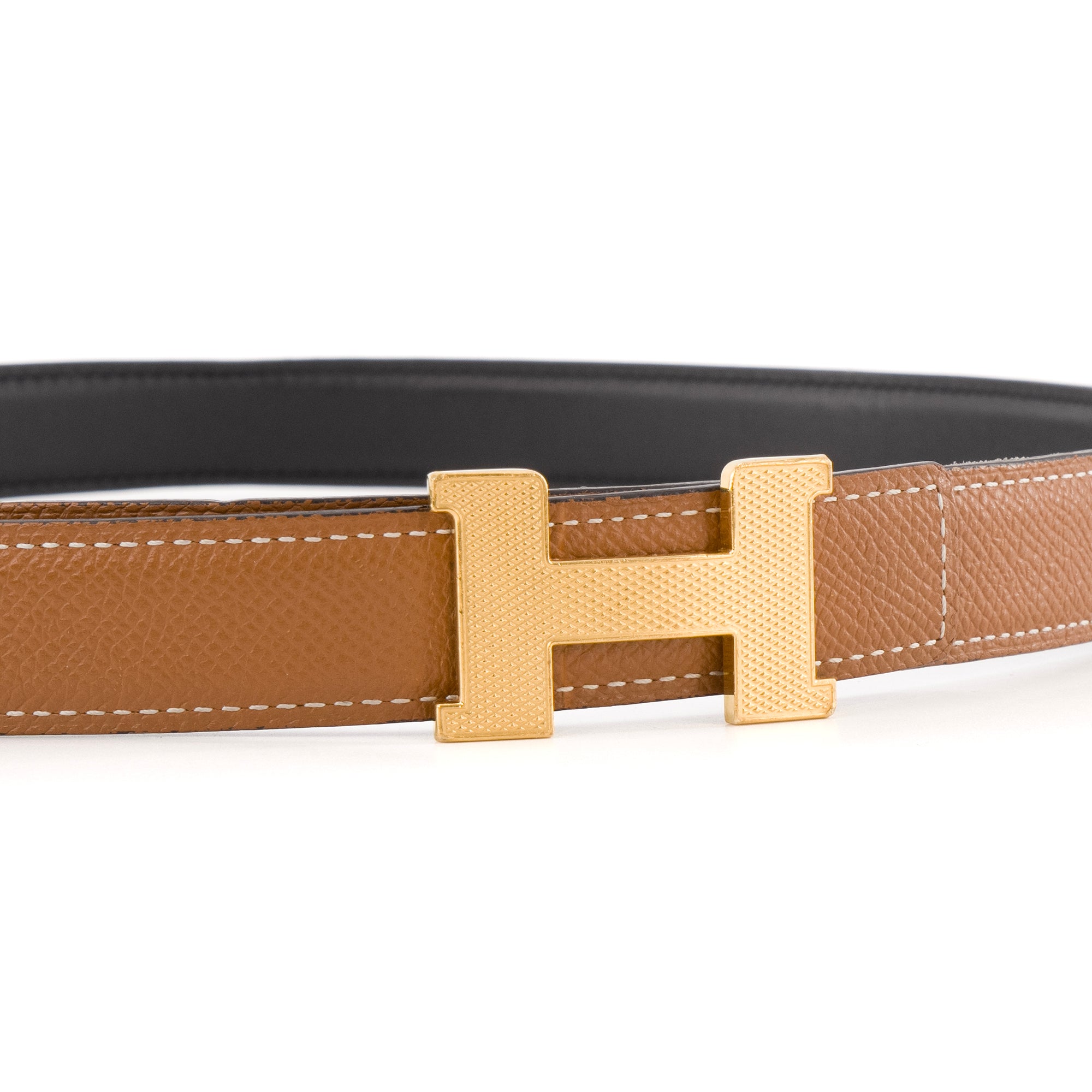 HERMÈS - Ceinture H réversible Hermès en cuir noir et marron (T85)