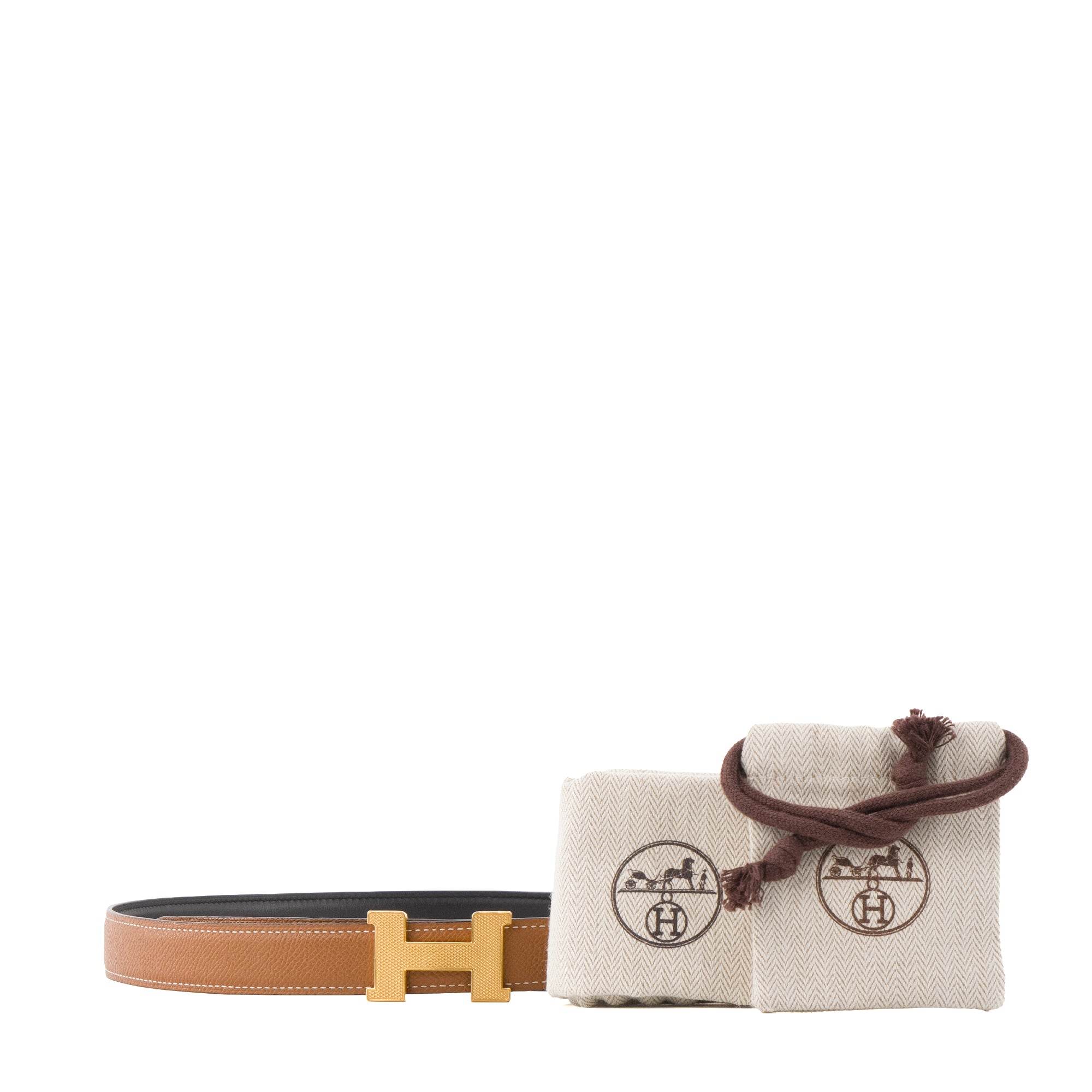 HERMÈS - Ceinture H réversible Hermès en cuir noir et marron (T85)