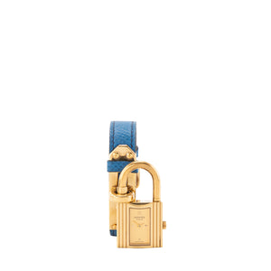 HERMÈS - Montre Kelly Hermès en cuir grainé bleu et métal doré